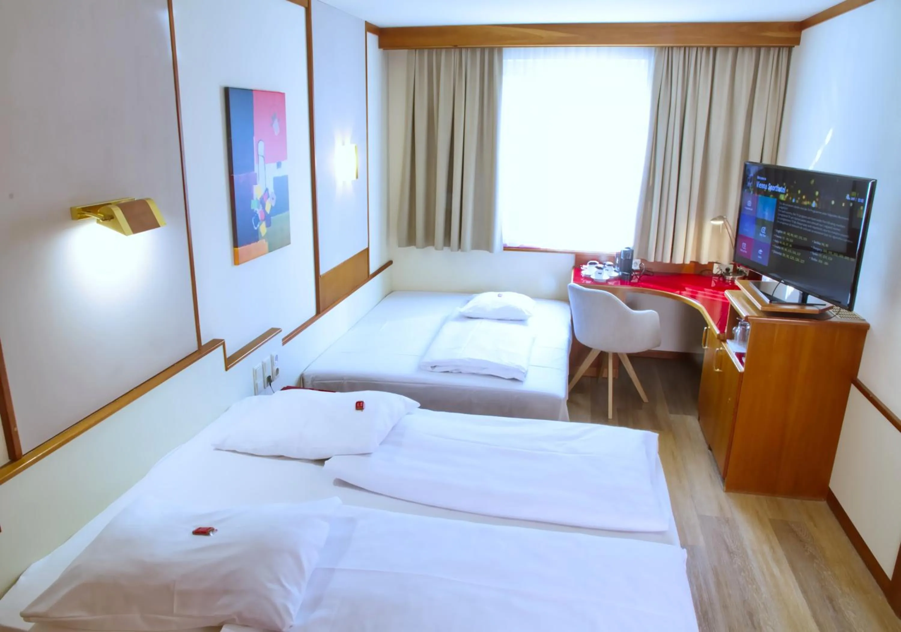 Bed in Vienna Sporthotel