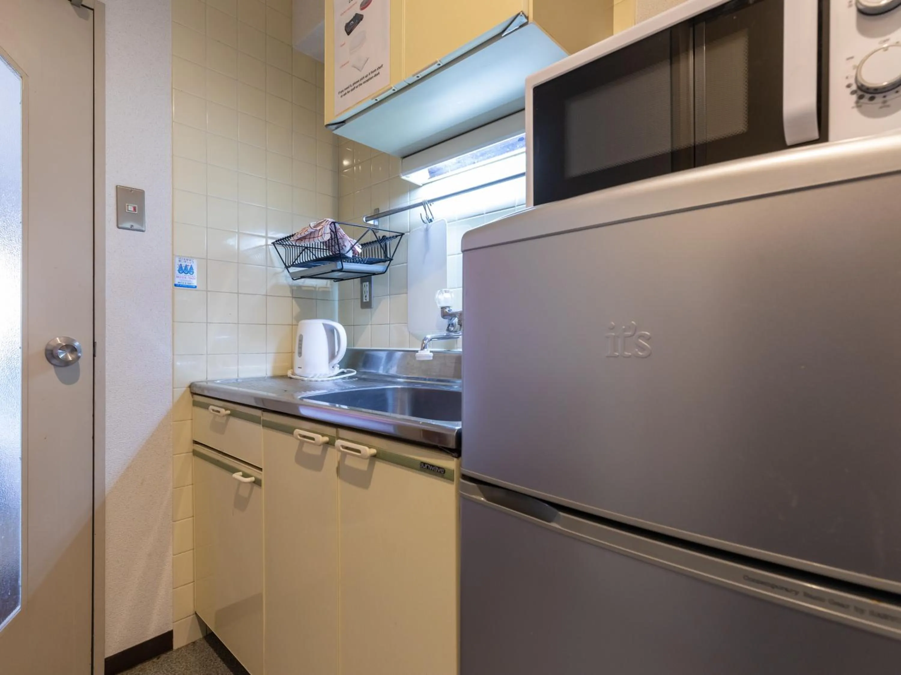 Kitchen or kitchenette, Kitchen/Kitchenette in Sakura Guesthouse