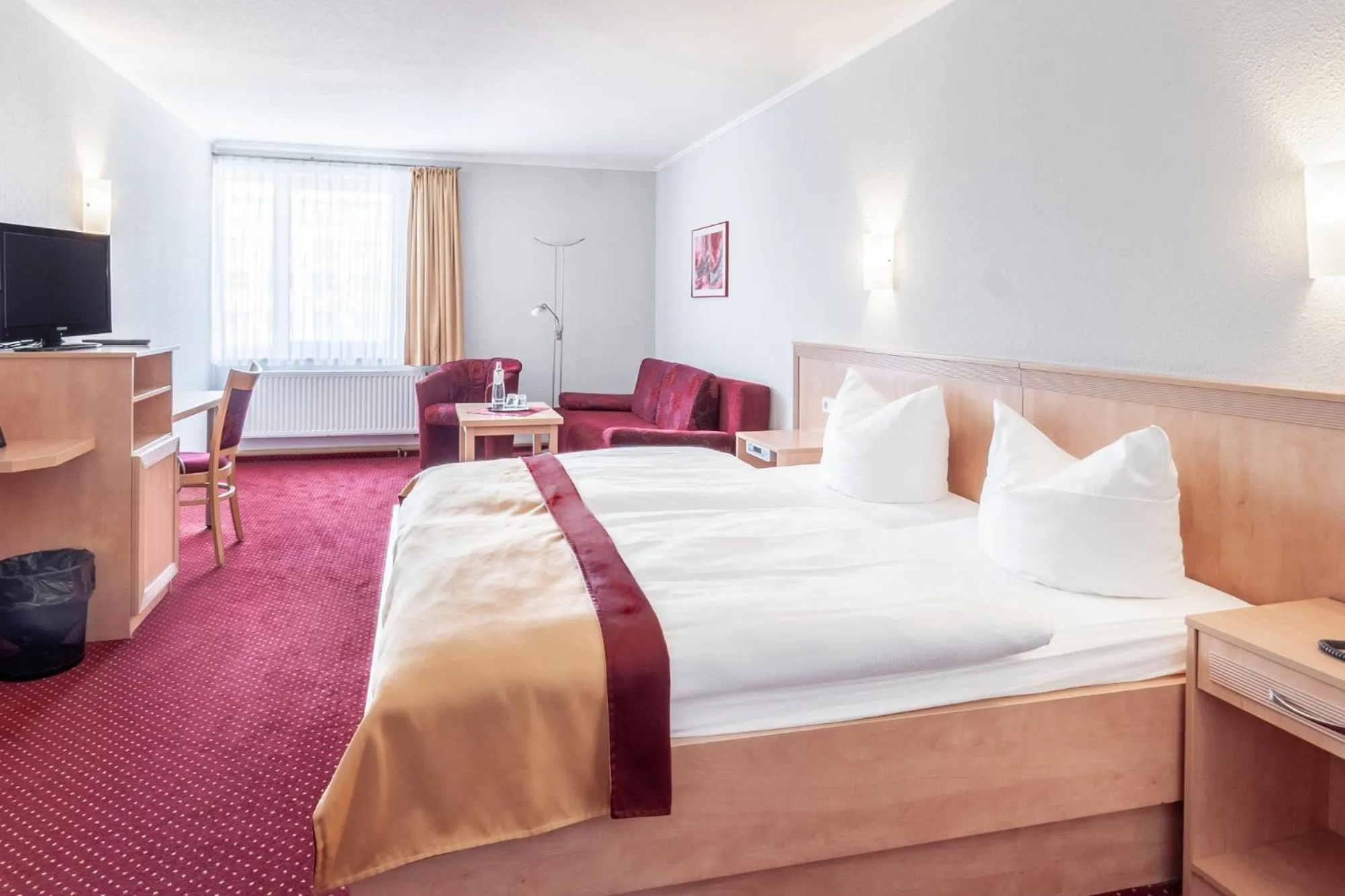 Photo of the whole room, Bed in Sporthotel Neuruppin