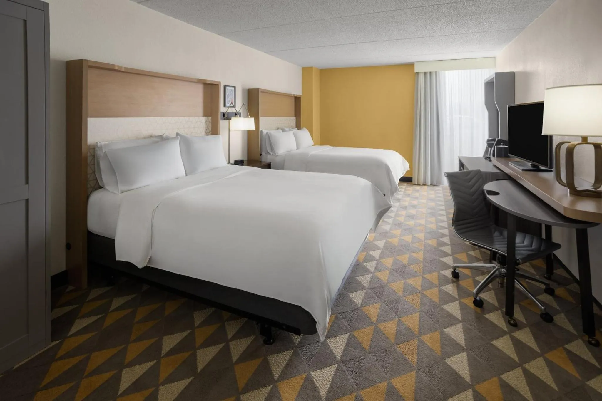 Photo of the whole room, Bed in Holiday Inn Morgantown - Reading Area by IHG