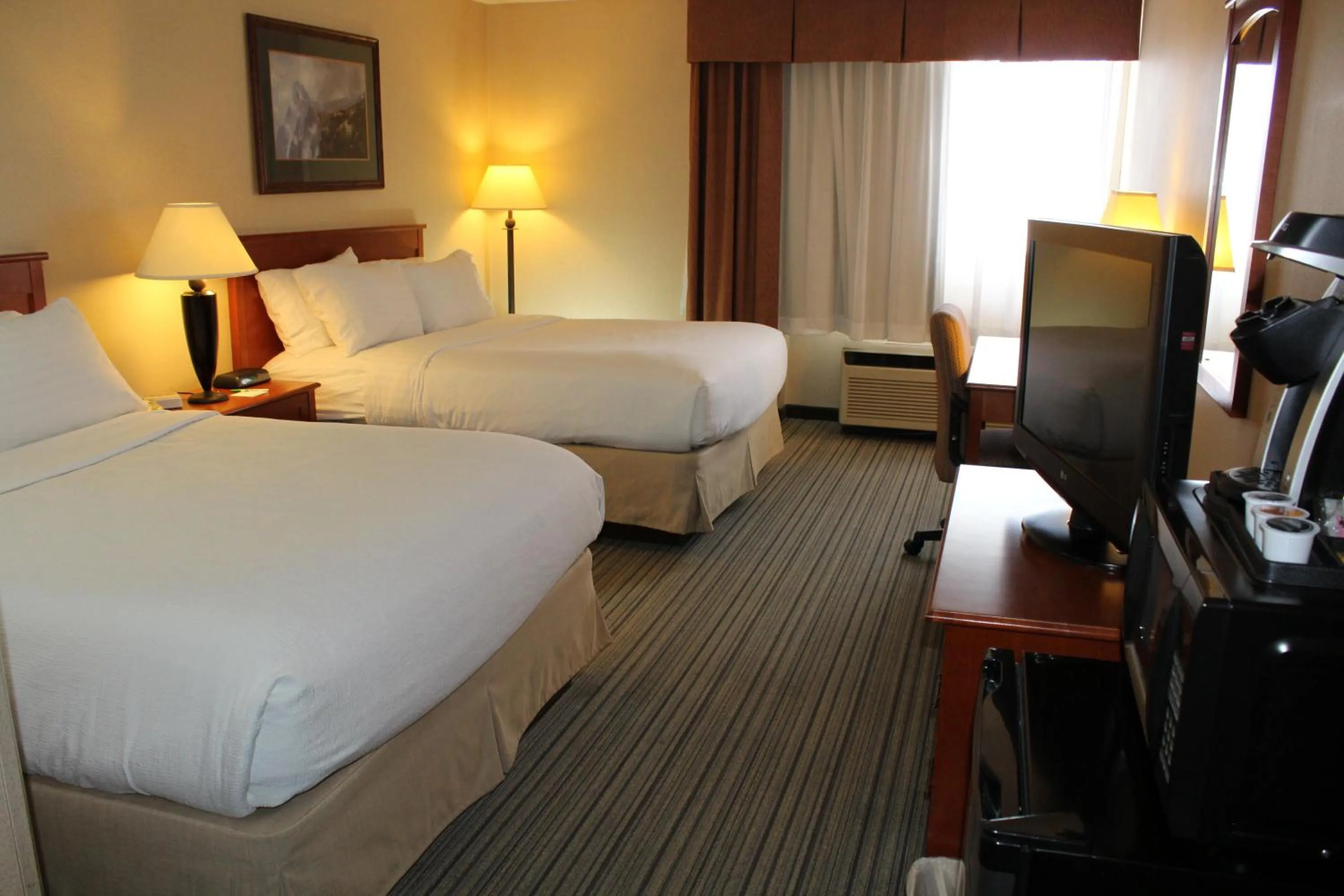 Photo of the whole room, TV/Entertainment Center in 3 Rivers Hotel