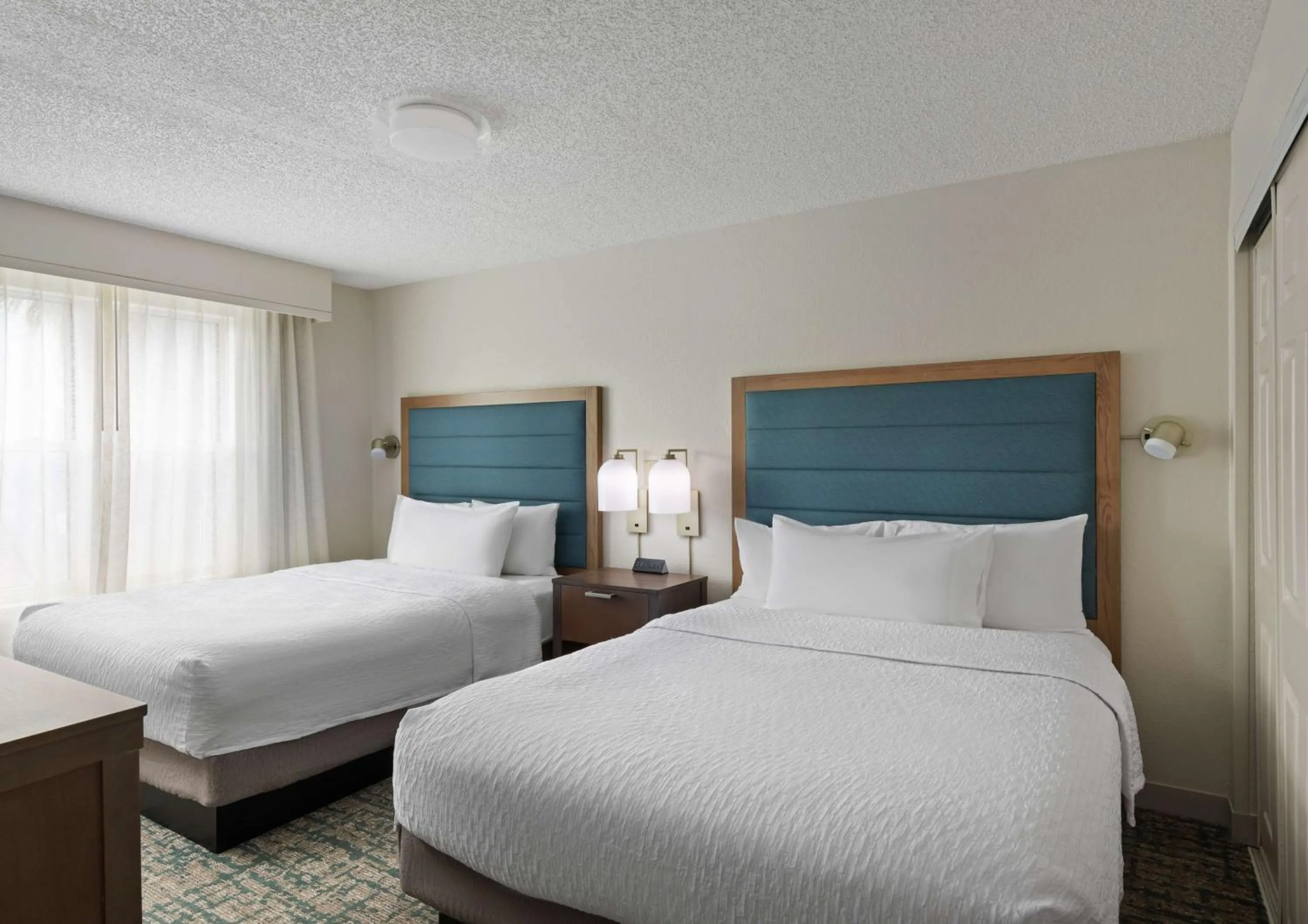 Bed in Homewood Suites by Hilton Lake Mary Orlando North