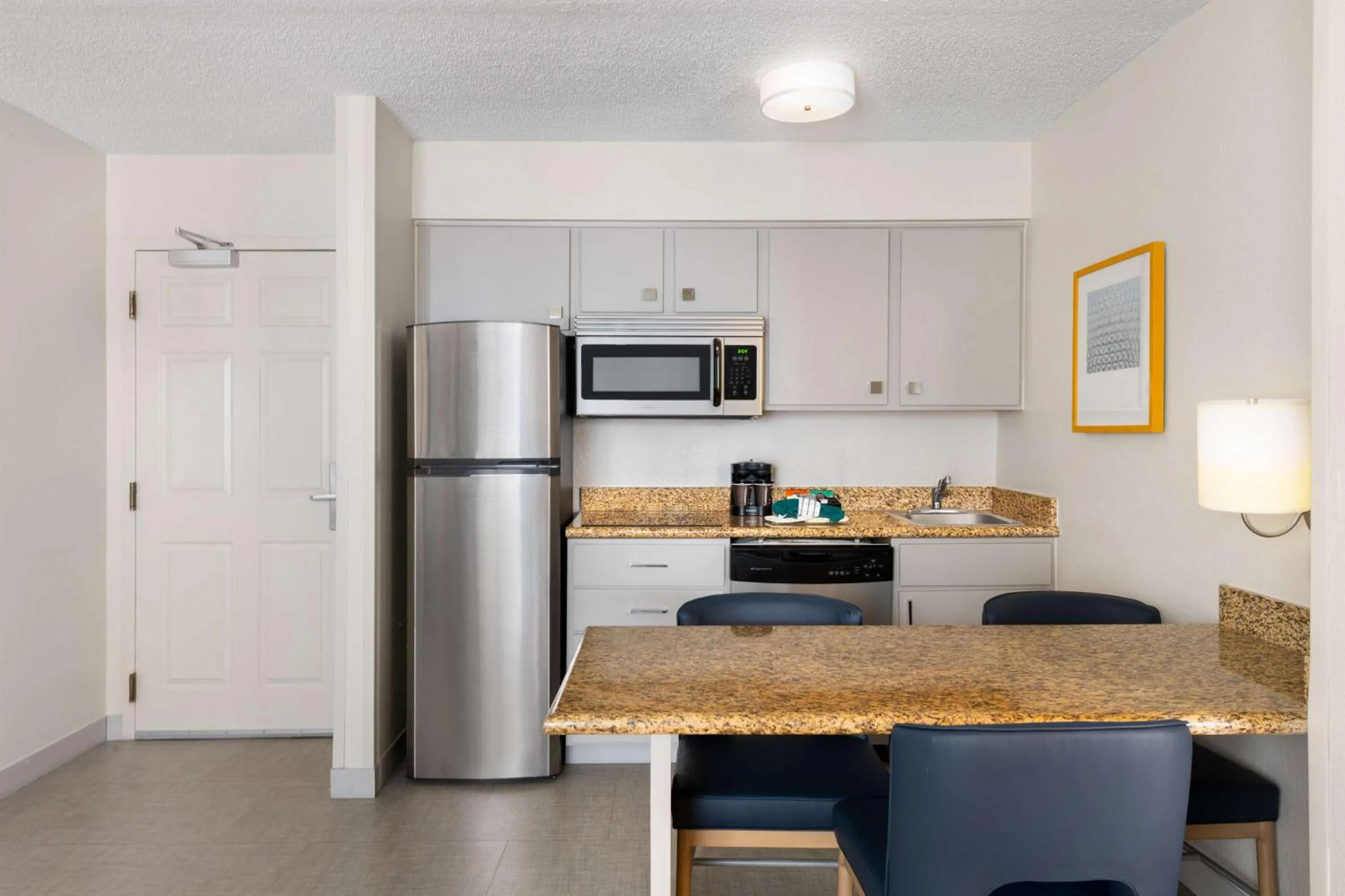 Kitchen or kitchenette in Homewood Suites by Hilton Lake Mary Orlando North