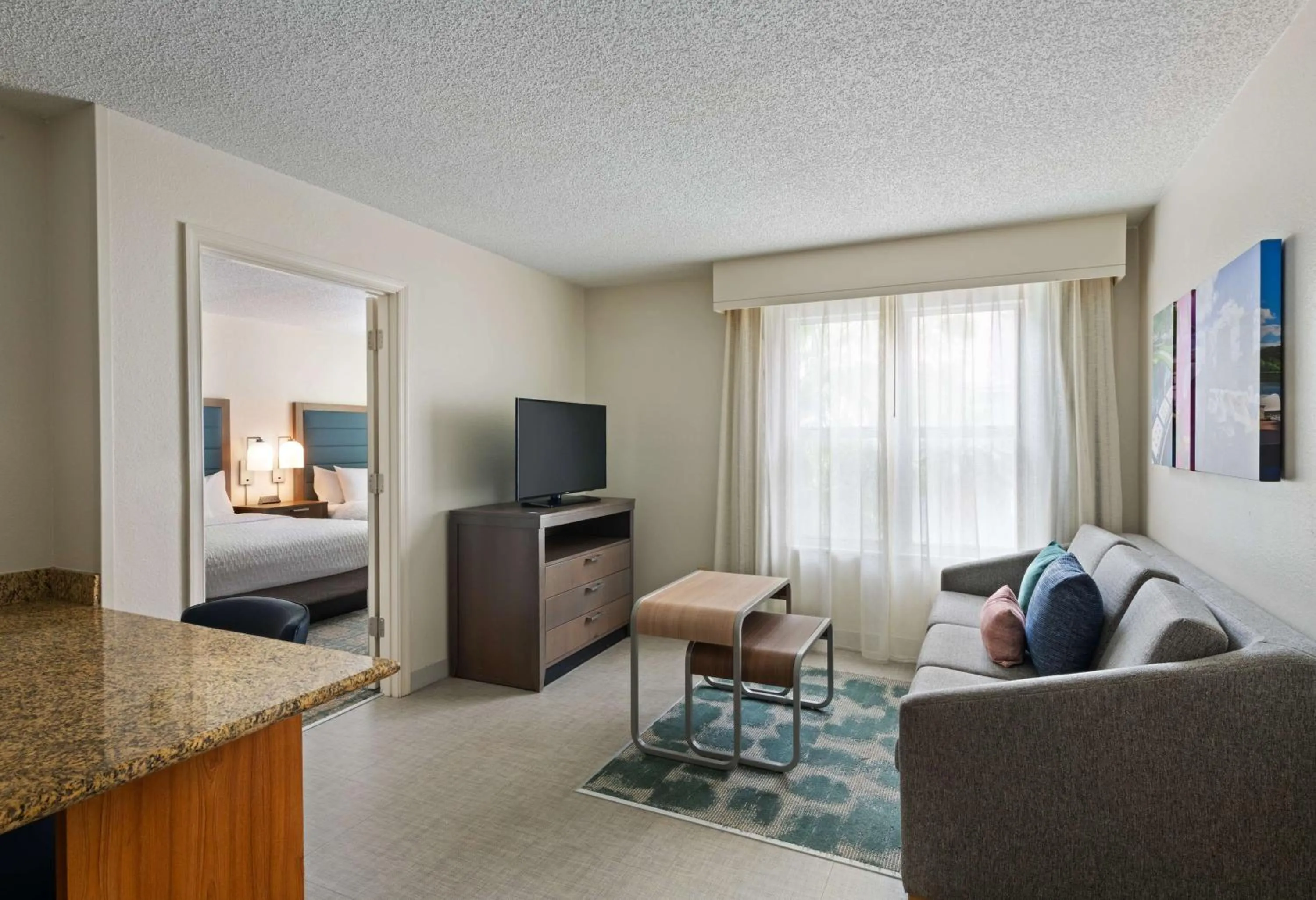 Living room, Bed in Homewood Suites by Hilton Lake Mary Orlando North