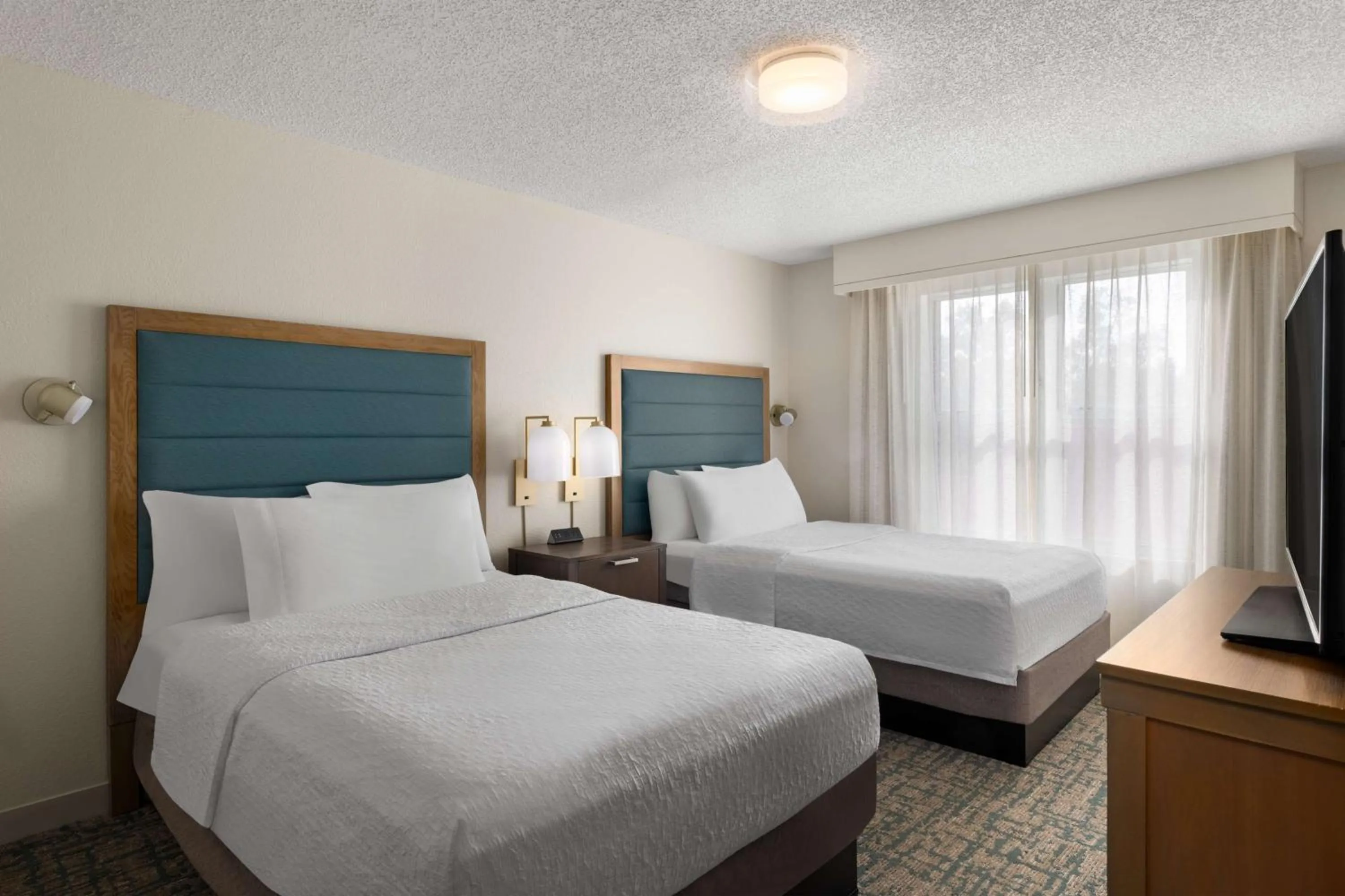 Bed in Homewood Suites by Hilton Lake Mary Orlando North