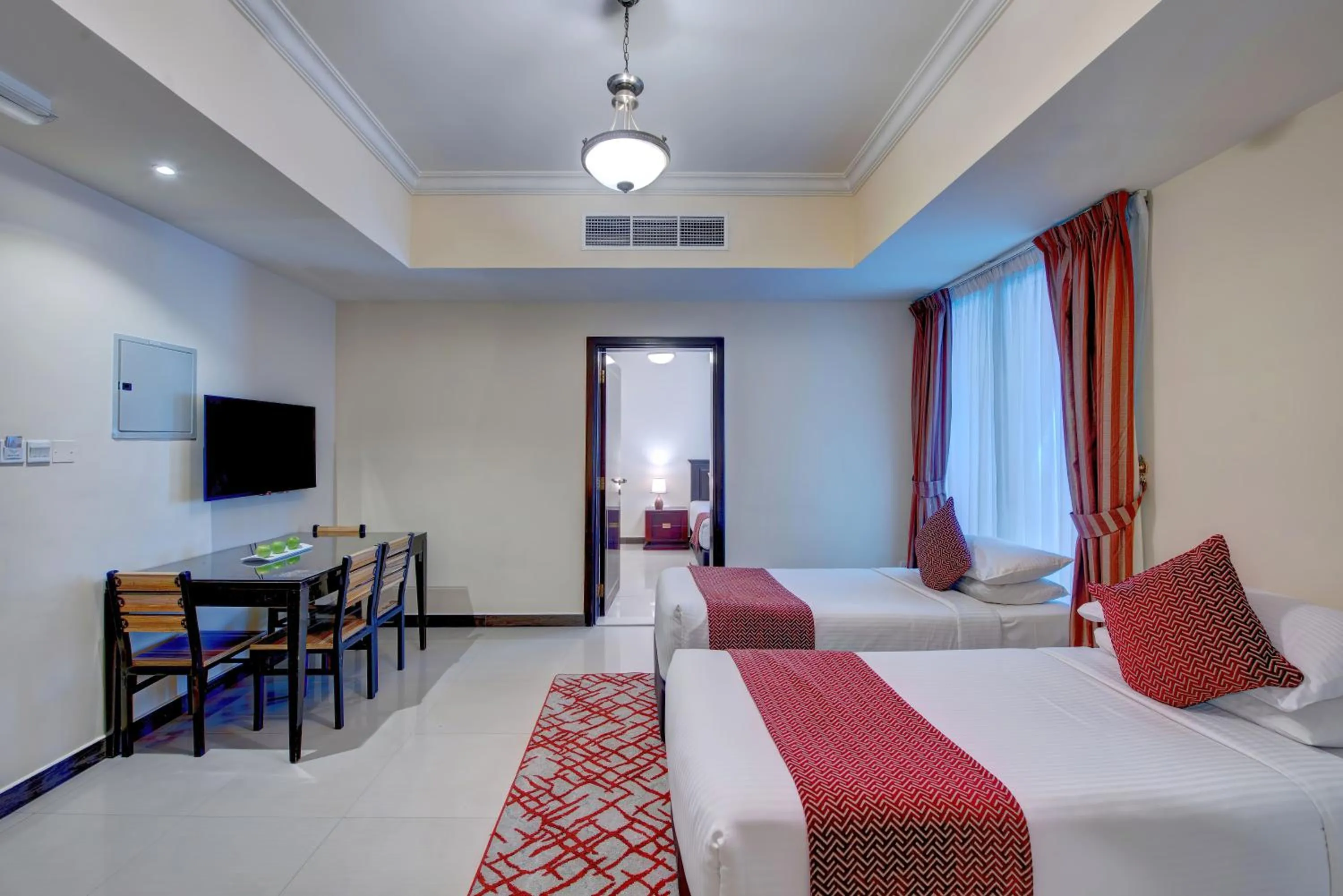 Communal lounge/ TV room, Bed in City Stay Premium Hotel Apartments