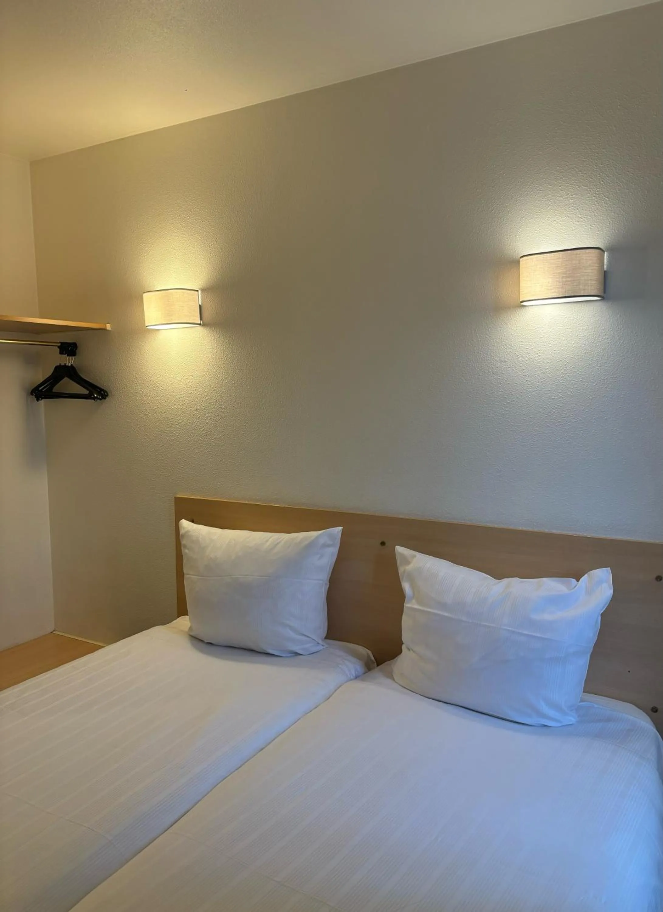 Bed in Hotel Premium