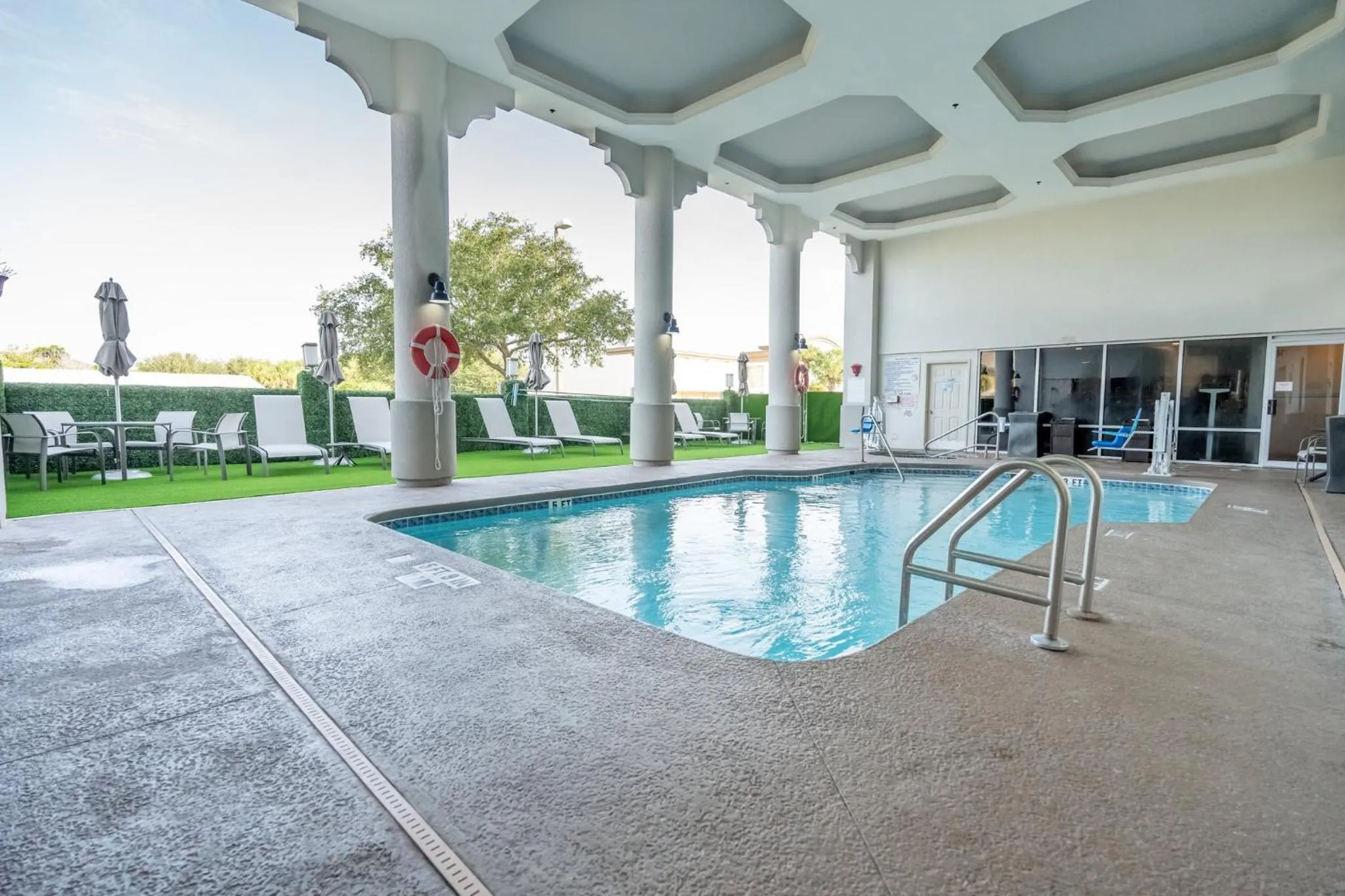 Swimming pool in Holiday Inn Express Hotel & Suites Cocoa Beach by IHG