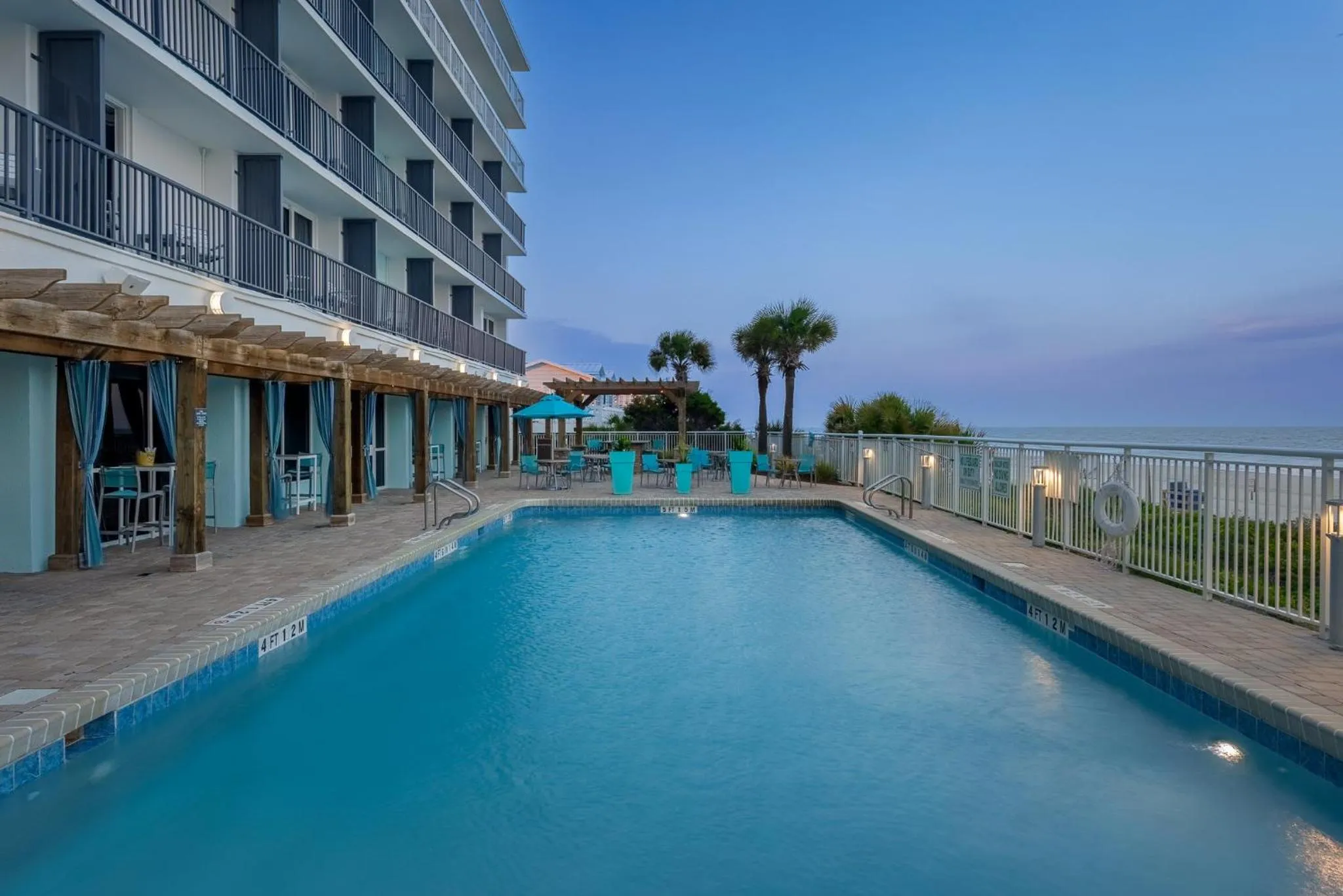Swimming pool in Holiday Inn Resort Oceanfront at Surfside Beach by IHG