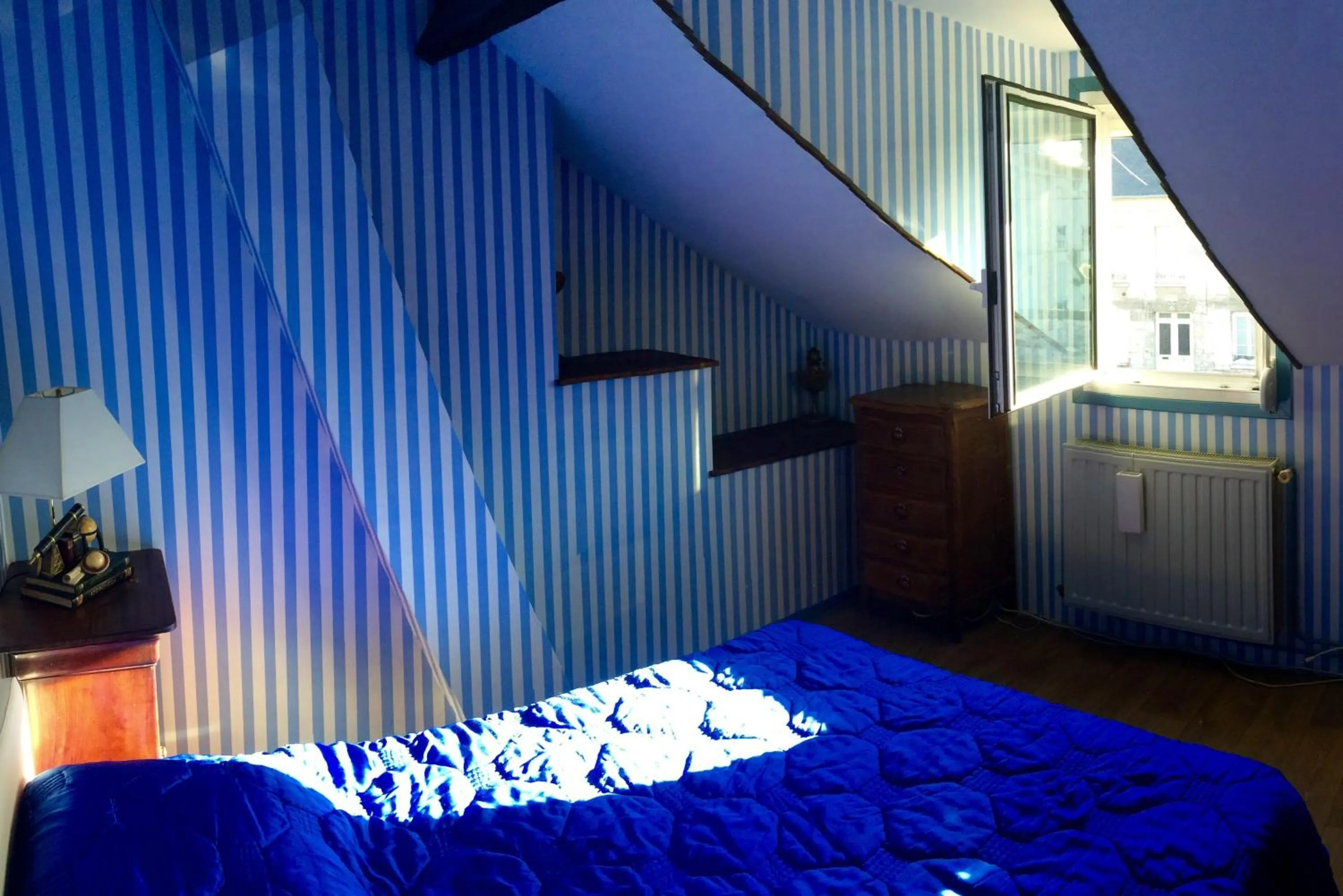 Photo of the whole room, Bed in Chez Madame Titus