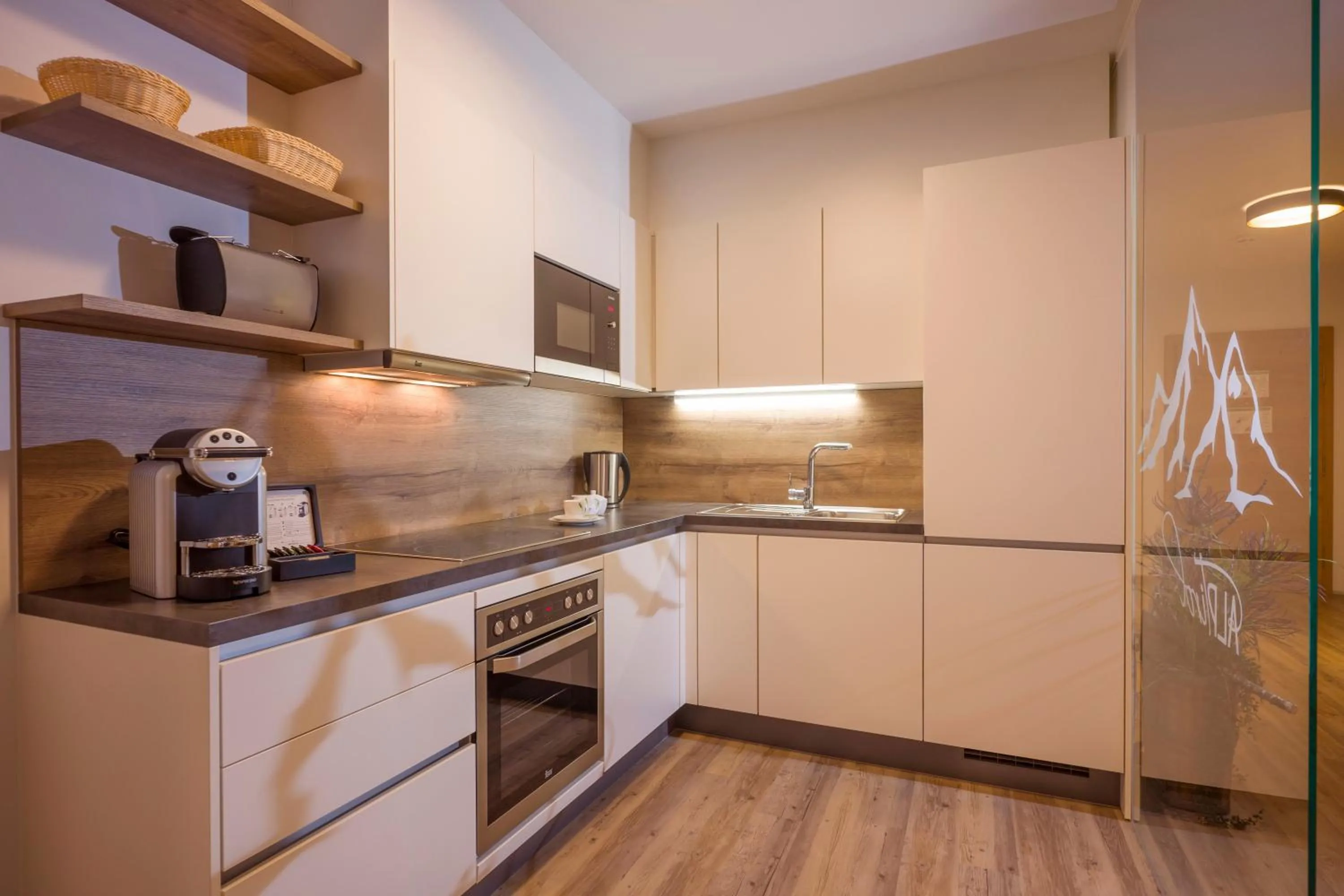 Kitchen or kitchenette in Aparthotel AlpTirol