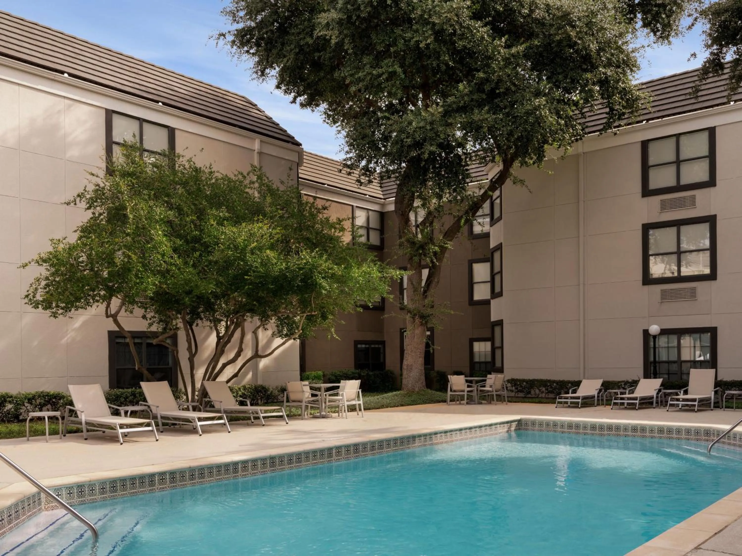 Swimming pool in Holiday Inn Express Hotel & Suites Irving DFW Airport North by IHG