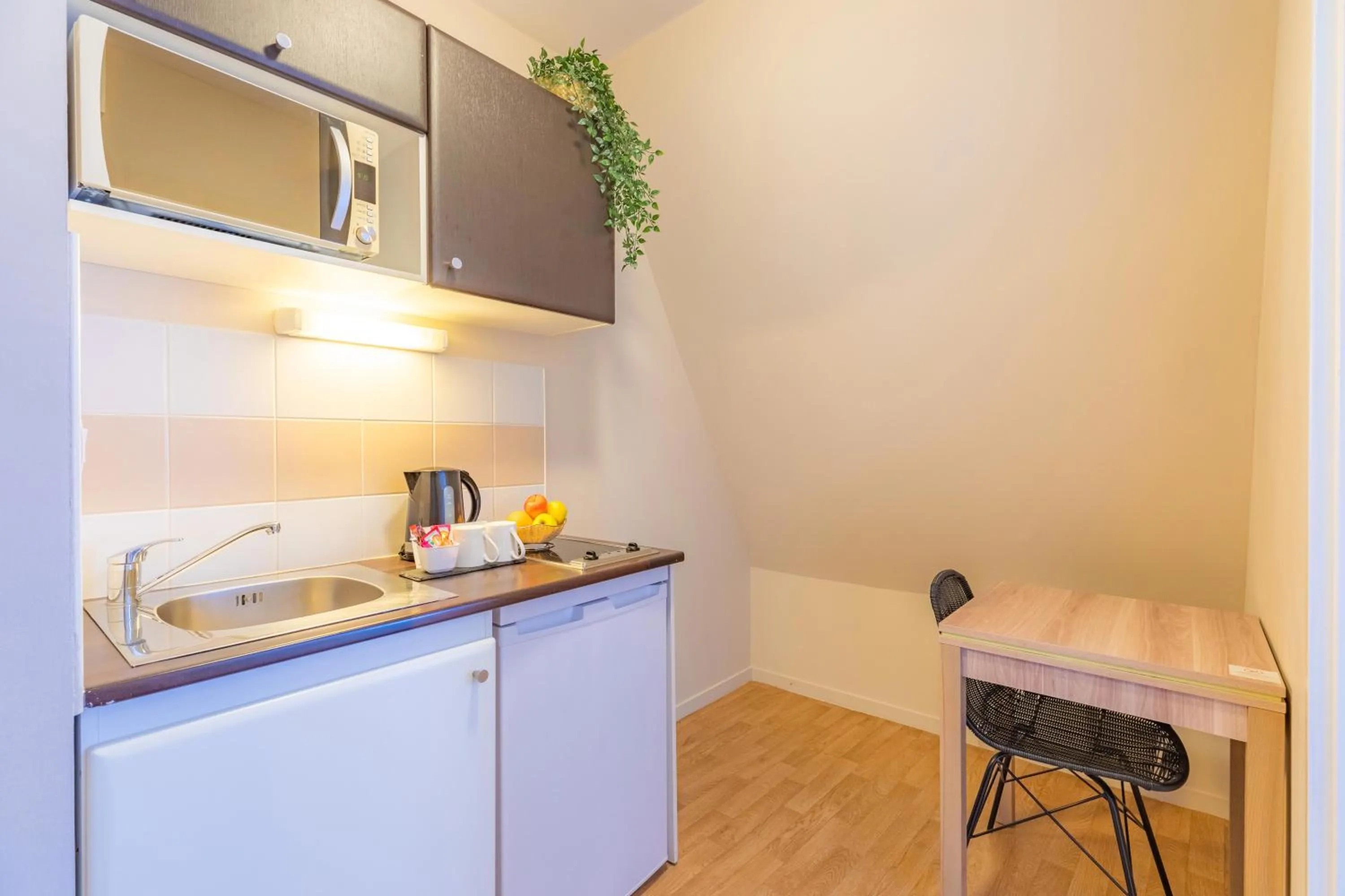 Kitchen or kitchenette in Appart’City Confort Nantes Centre