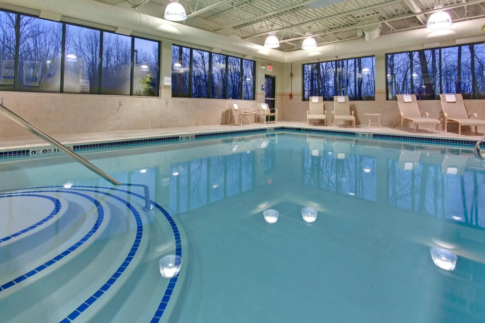Swimming pool in Holiday Inn Express & Suites Detroit - Novi by IHG