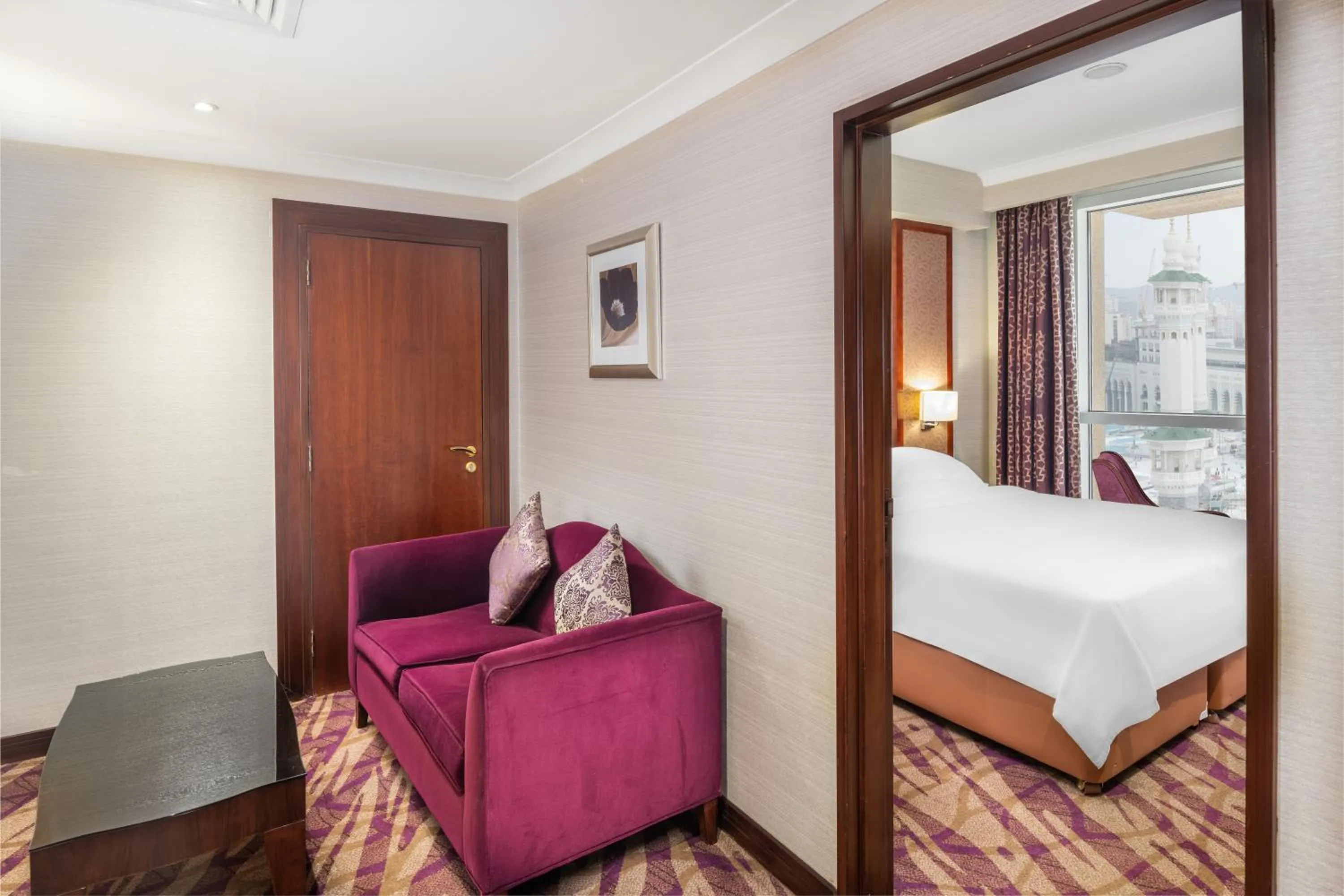 Seating area, Bed in Al Marwa Rayhaan by Rotana - Makkah