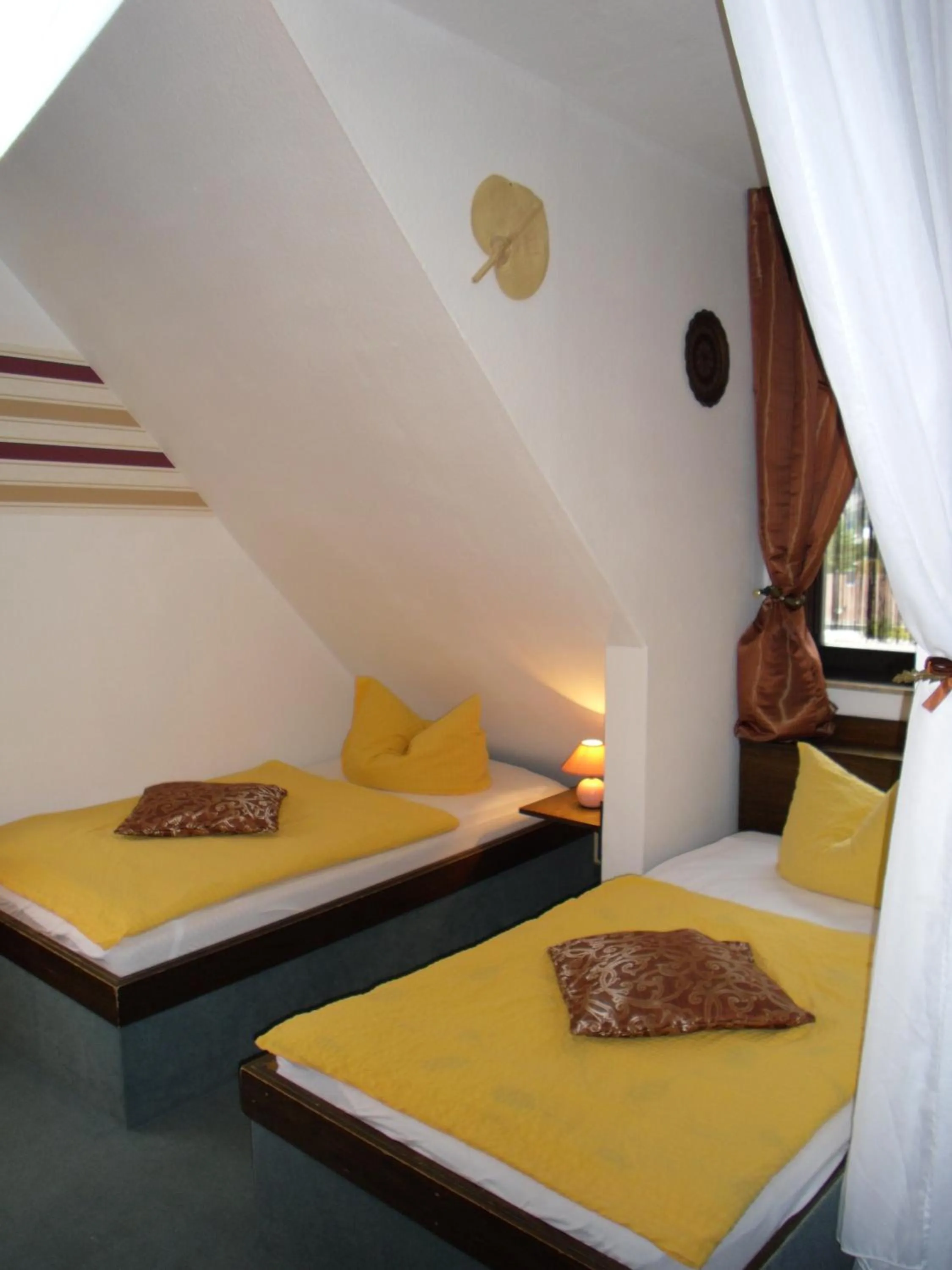 Photo of the whole room, Bed in Frau Holle-Land-Hotel Witzenhausen