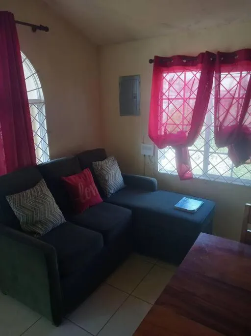 TV and multimedia in Cheerful 2-Bedroom Home in Falmouth Garden