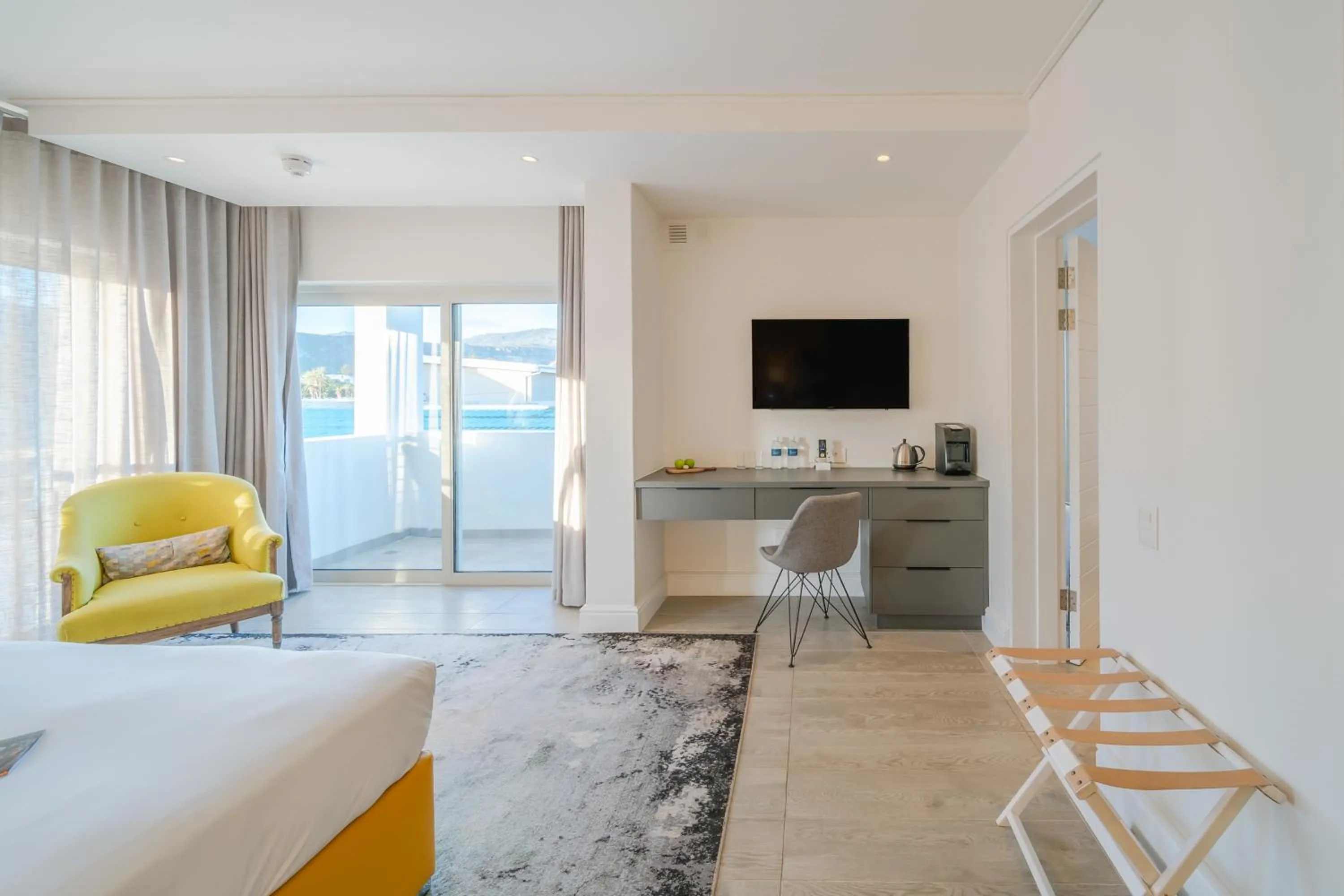 TV and multimedia in One Marine Drive Boutique Hotel & Spa by The Living Journey Collection