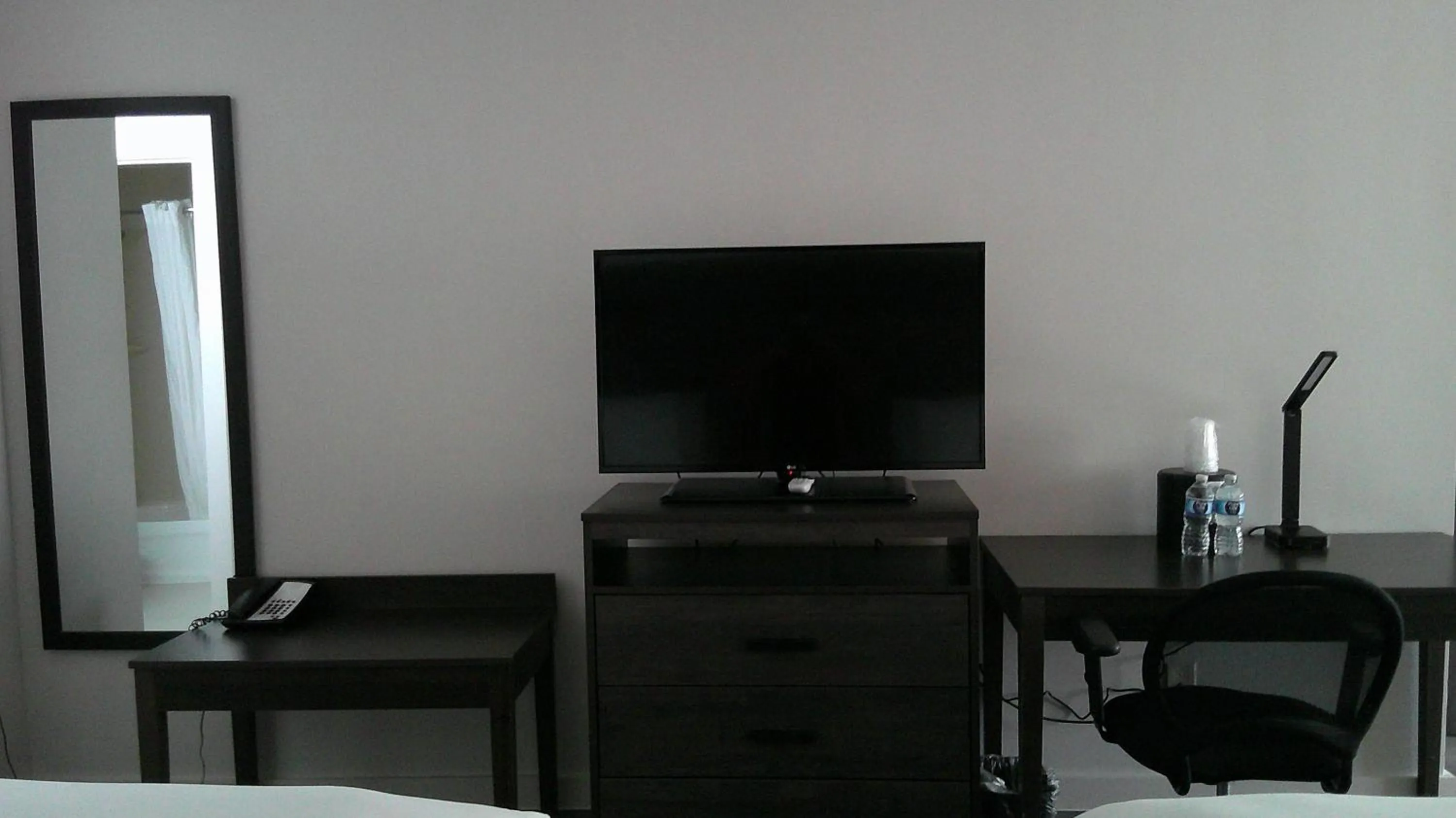 Bedroom in HOM Hotel Gainesville, SureStay Collection by Best Western