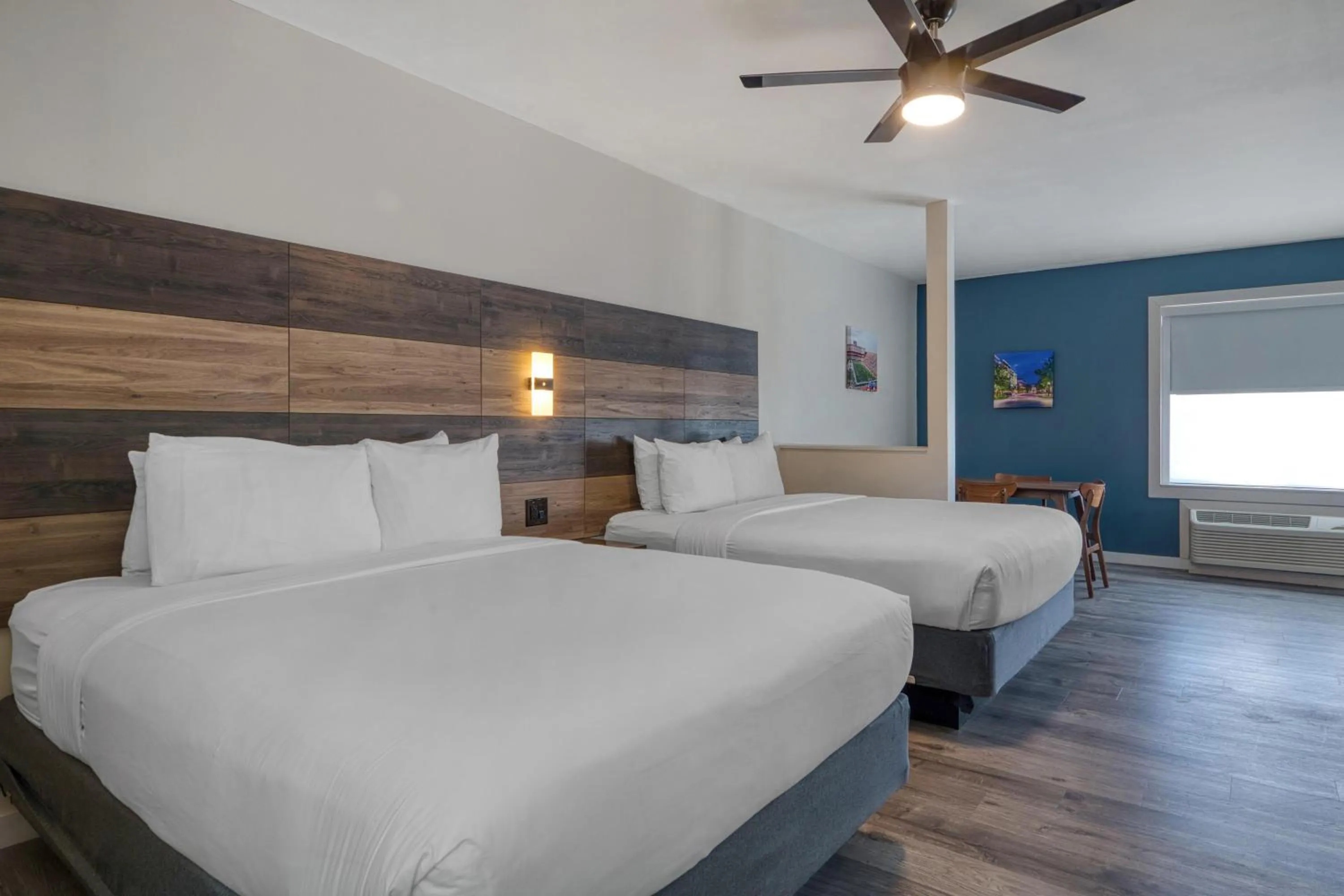 Bedroom, Bed in HOM Hotel Gainesville, SureStay Collection by Best Western