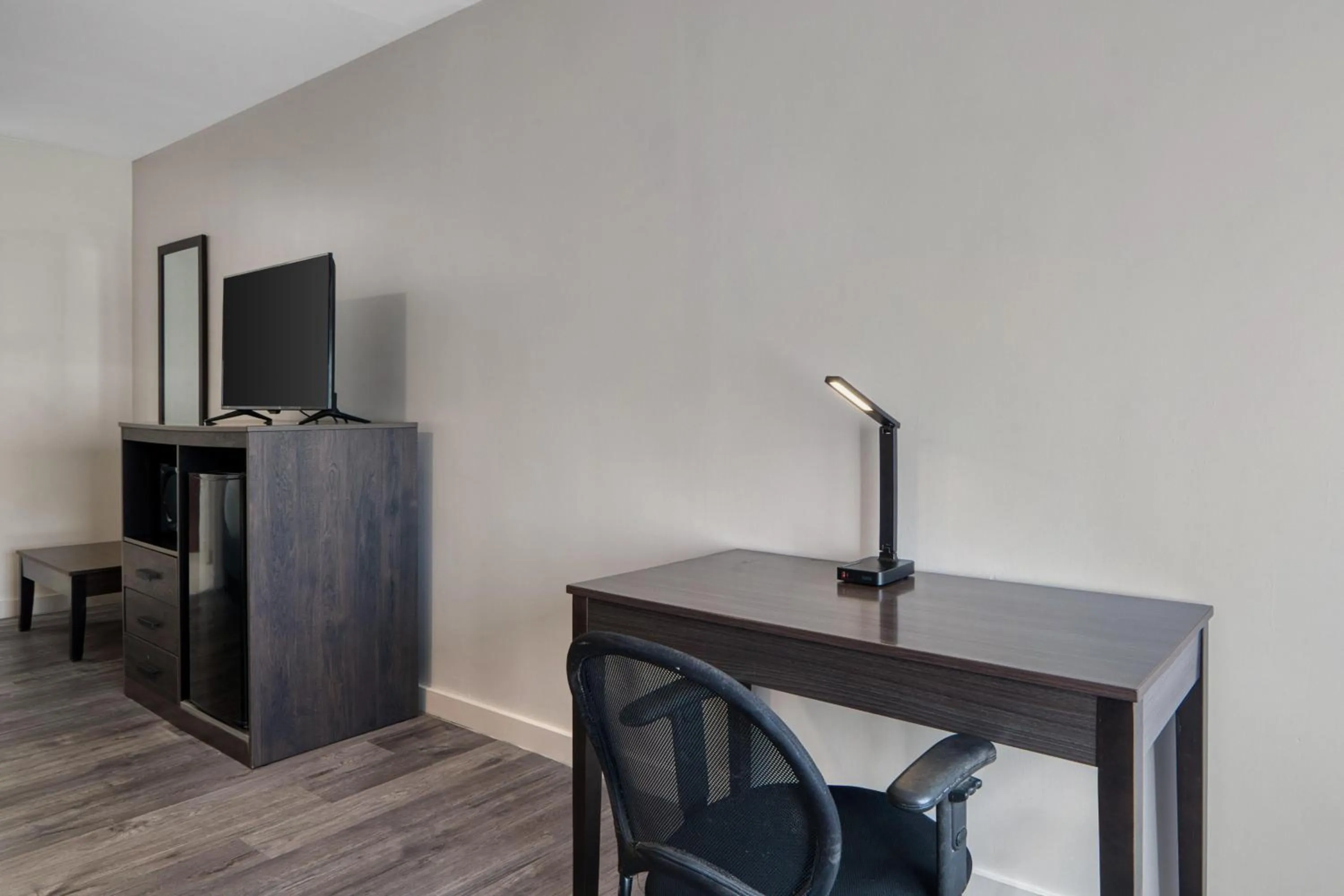 Bedroom in HOM Hotel Gainesville, SureStay Collection by Best Western