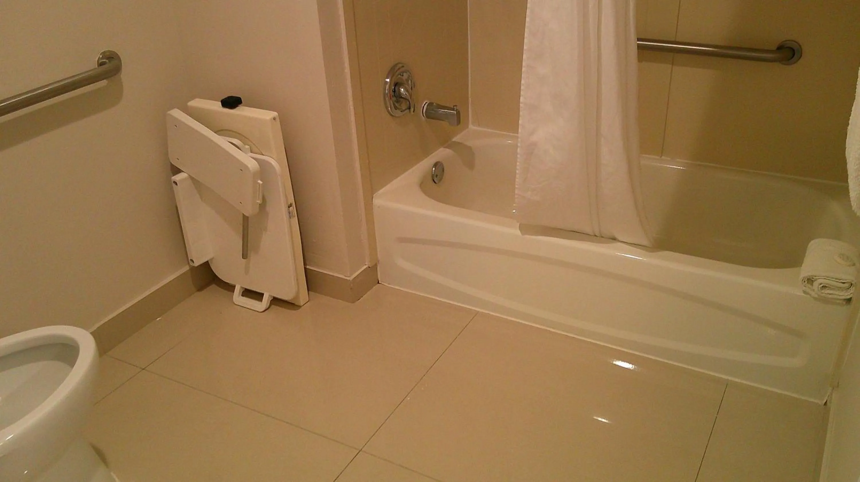 Bathroom in HOM Hotel Gainesville, SureStay Collection by Best Western