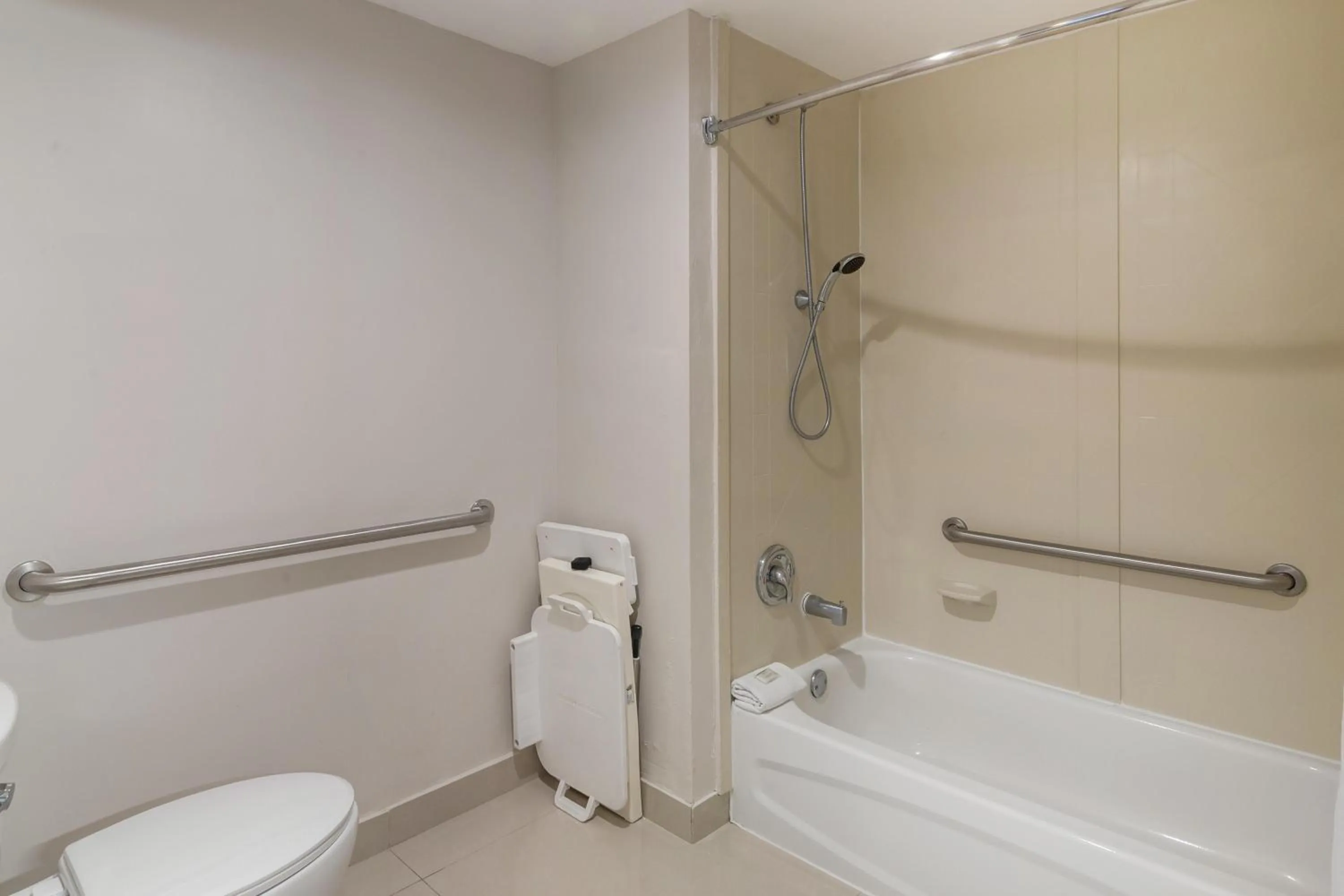Bathroom in HOM Hotel Gainesville, SureStay Collection by Best Western