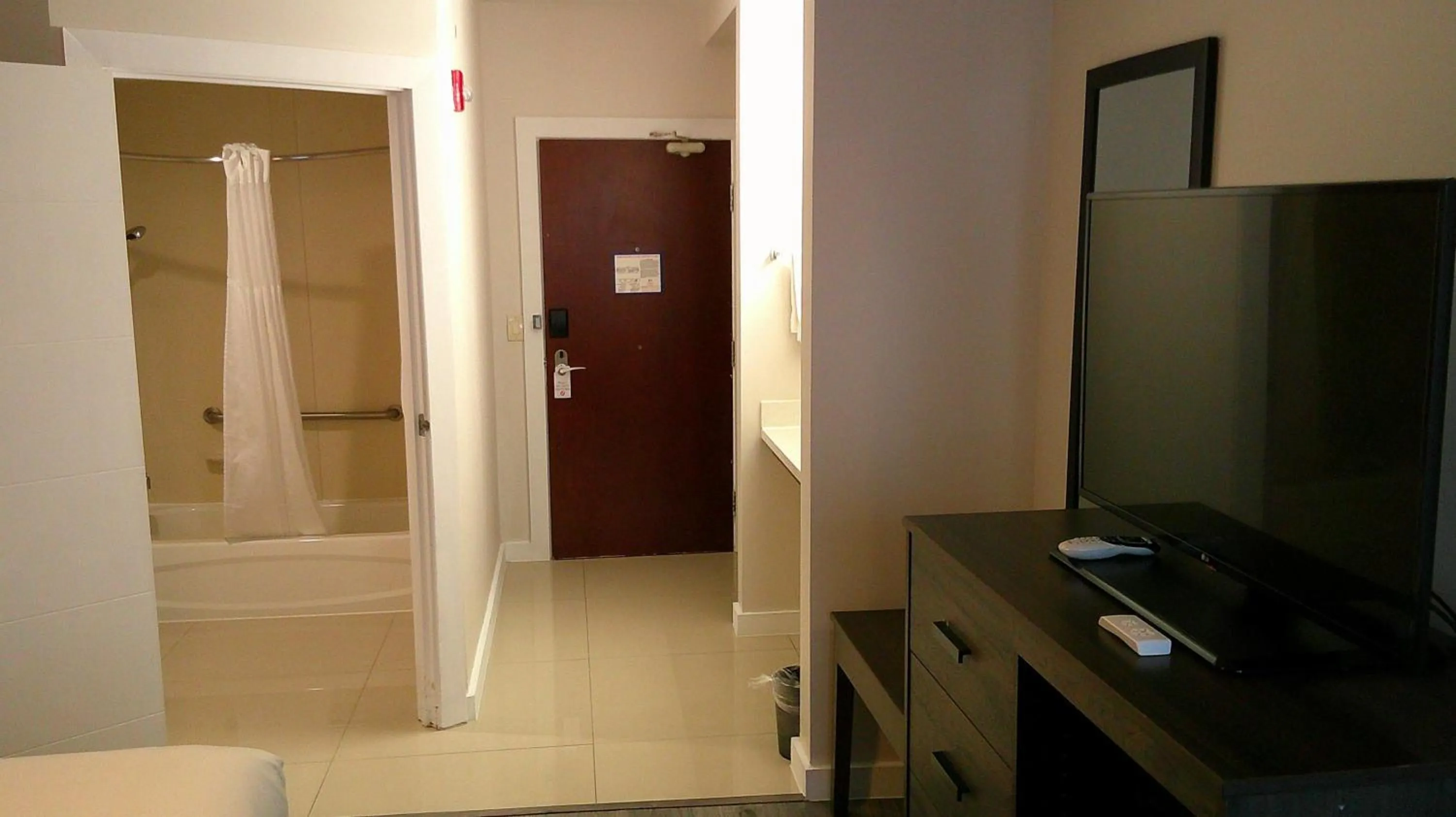 Bedroom in HOM Hotel Gainesville, SureStay Collection by Best Western
