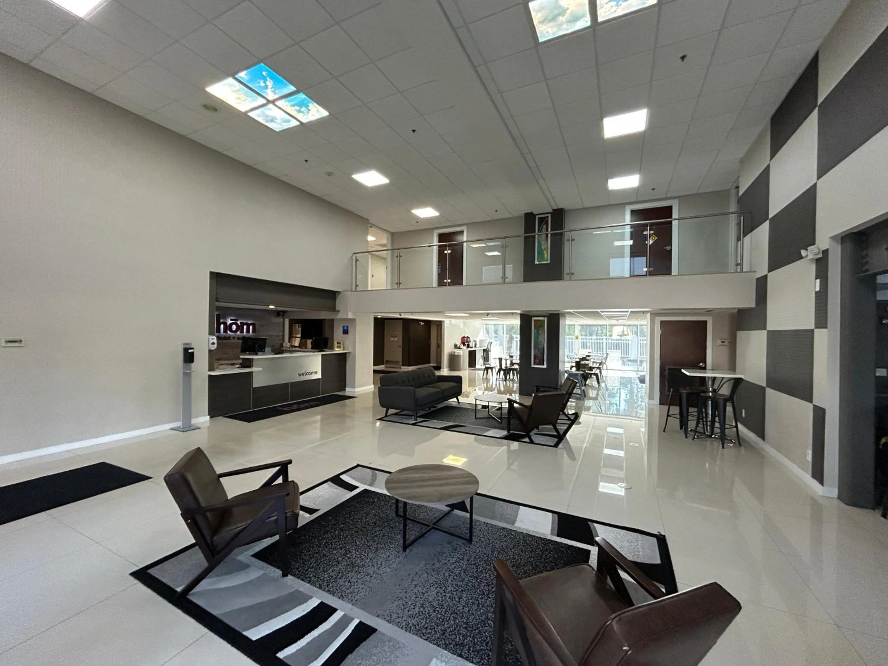 Lobby or reception in HOM Hotel Gainesville, SureStay Collection by Best Western
