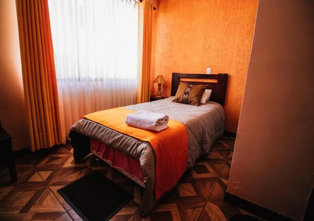 Photo of the whole room, Bed in Las Tholas Hotel