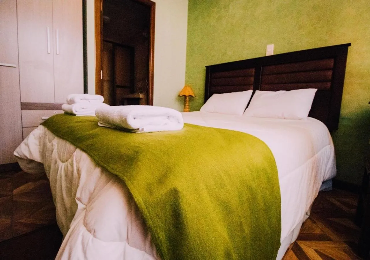 Photo of the whole room, Bed in Las Tholas Hotel