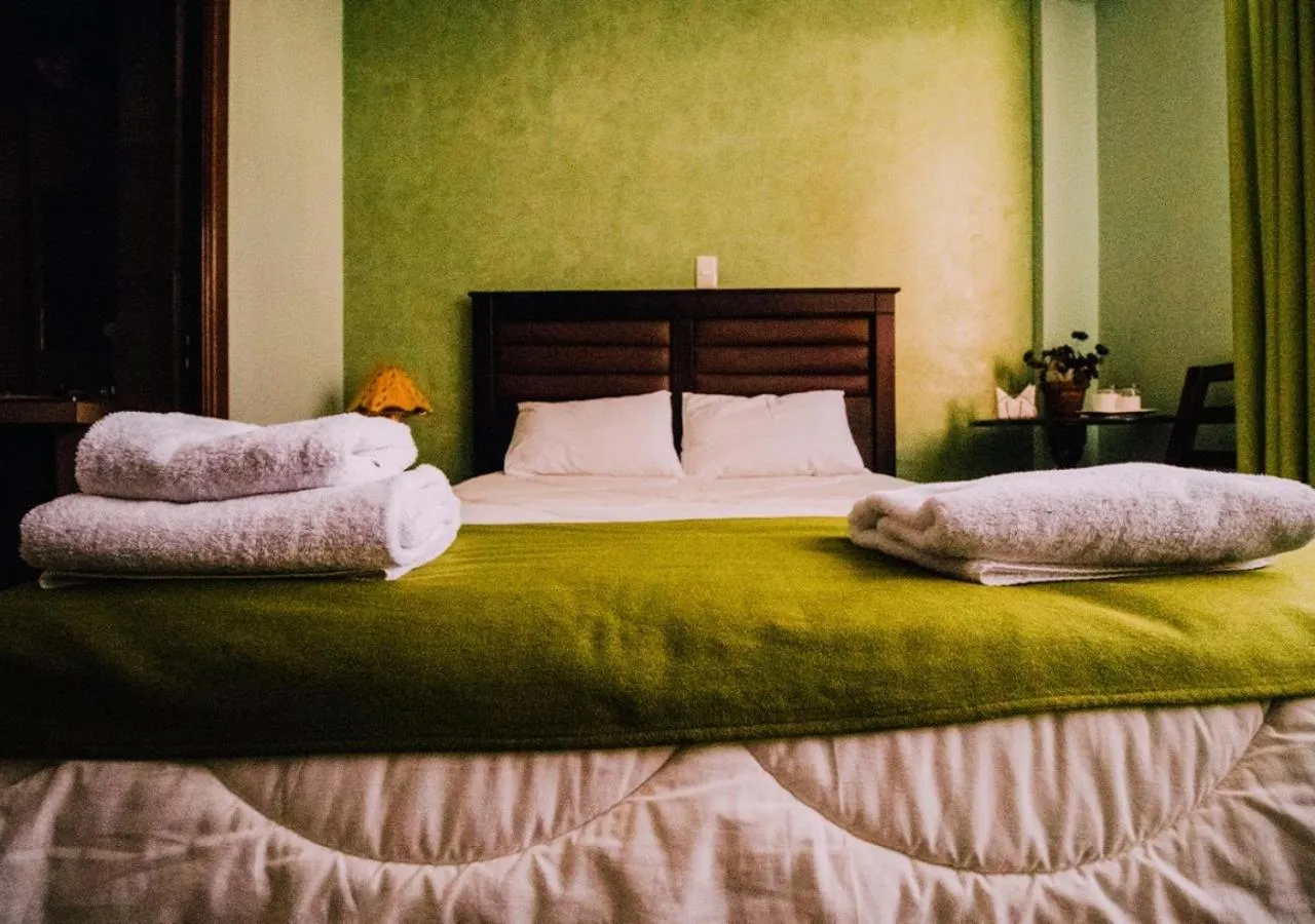 Photo of the whole room, Bed in Las Tholas Hotel