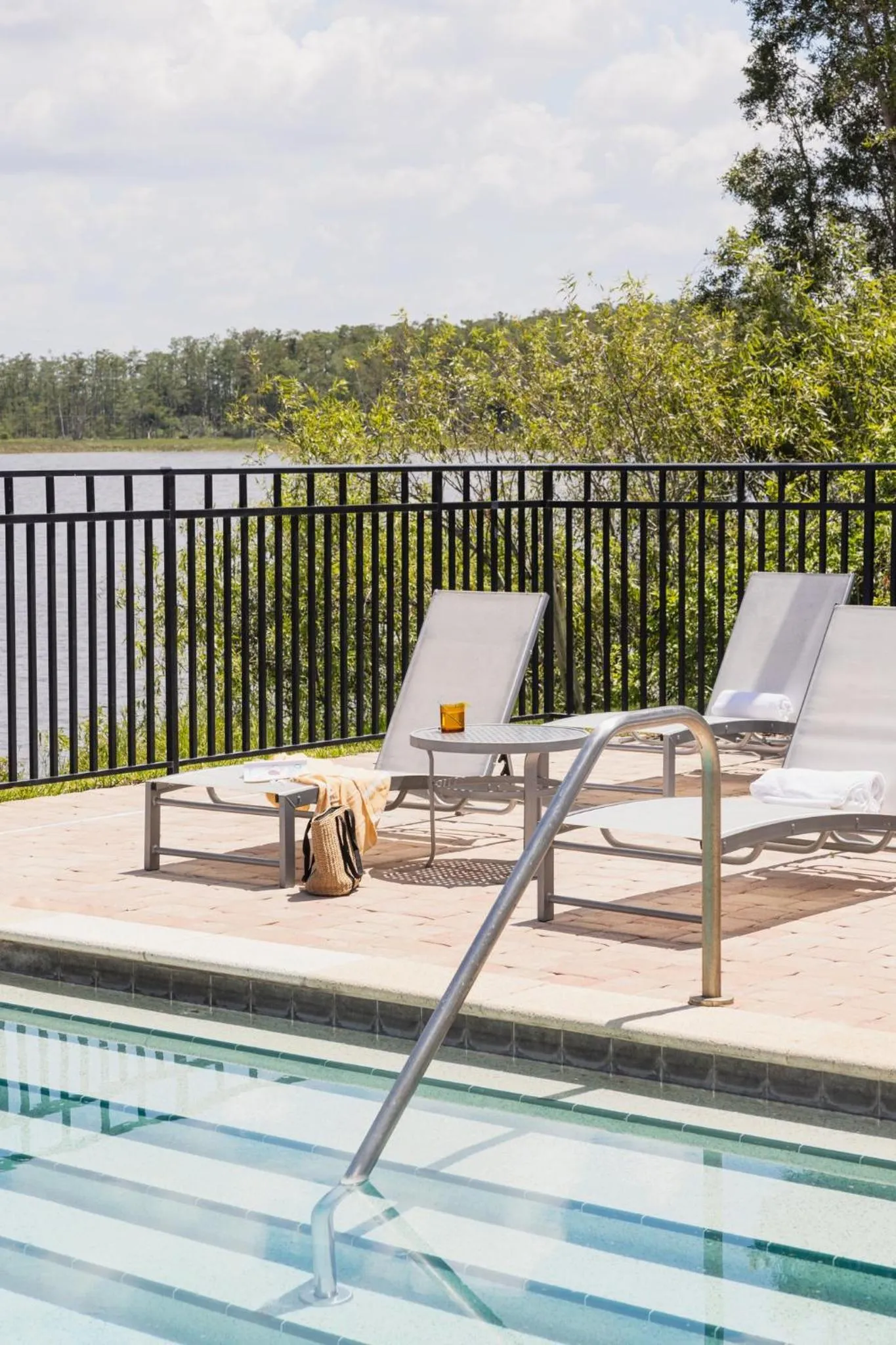 Swimming pool in Crowne Plaza Ft Myers Gulf Coast by IHG