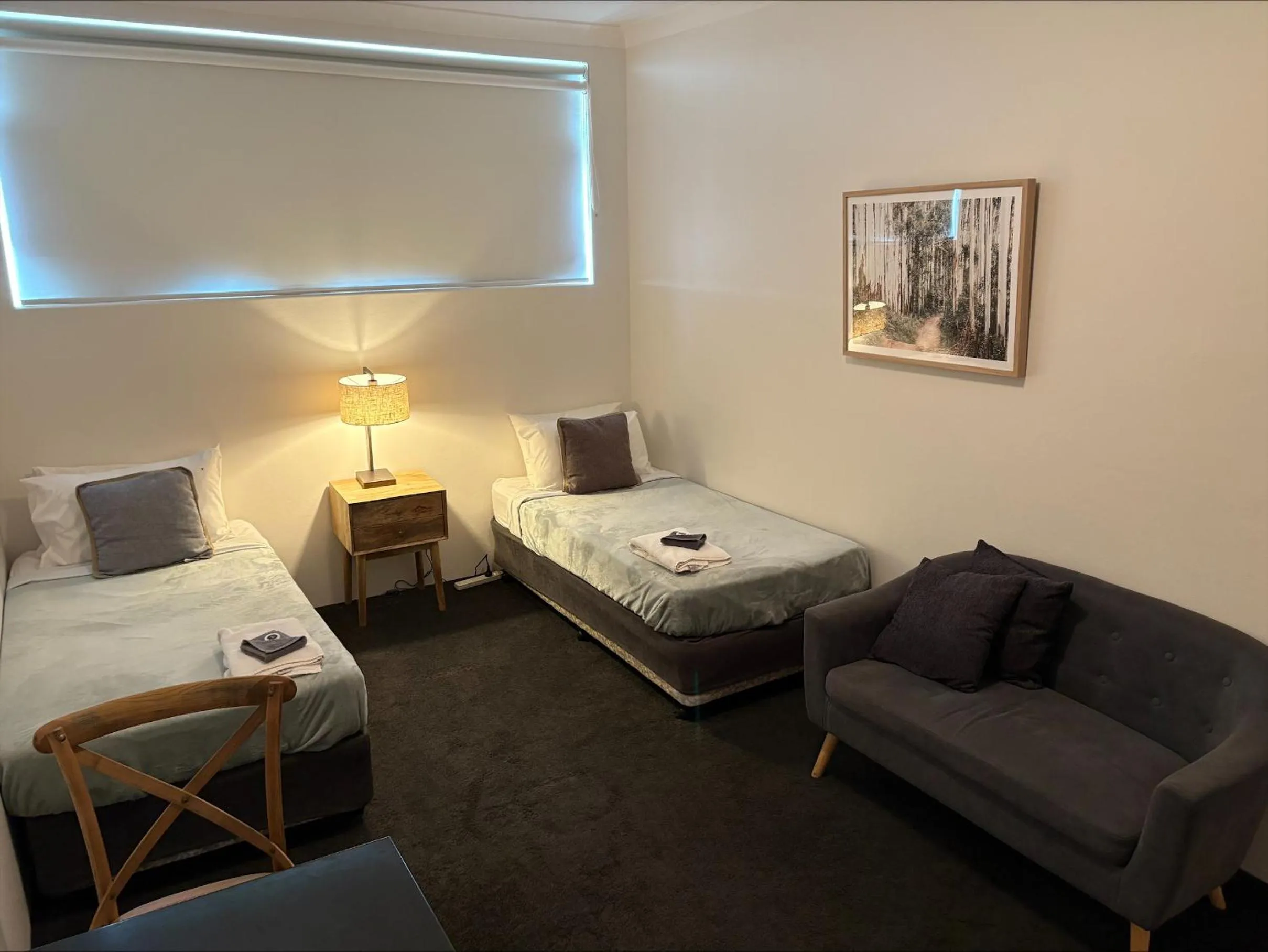 Bed in Tall Timbers Motel