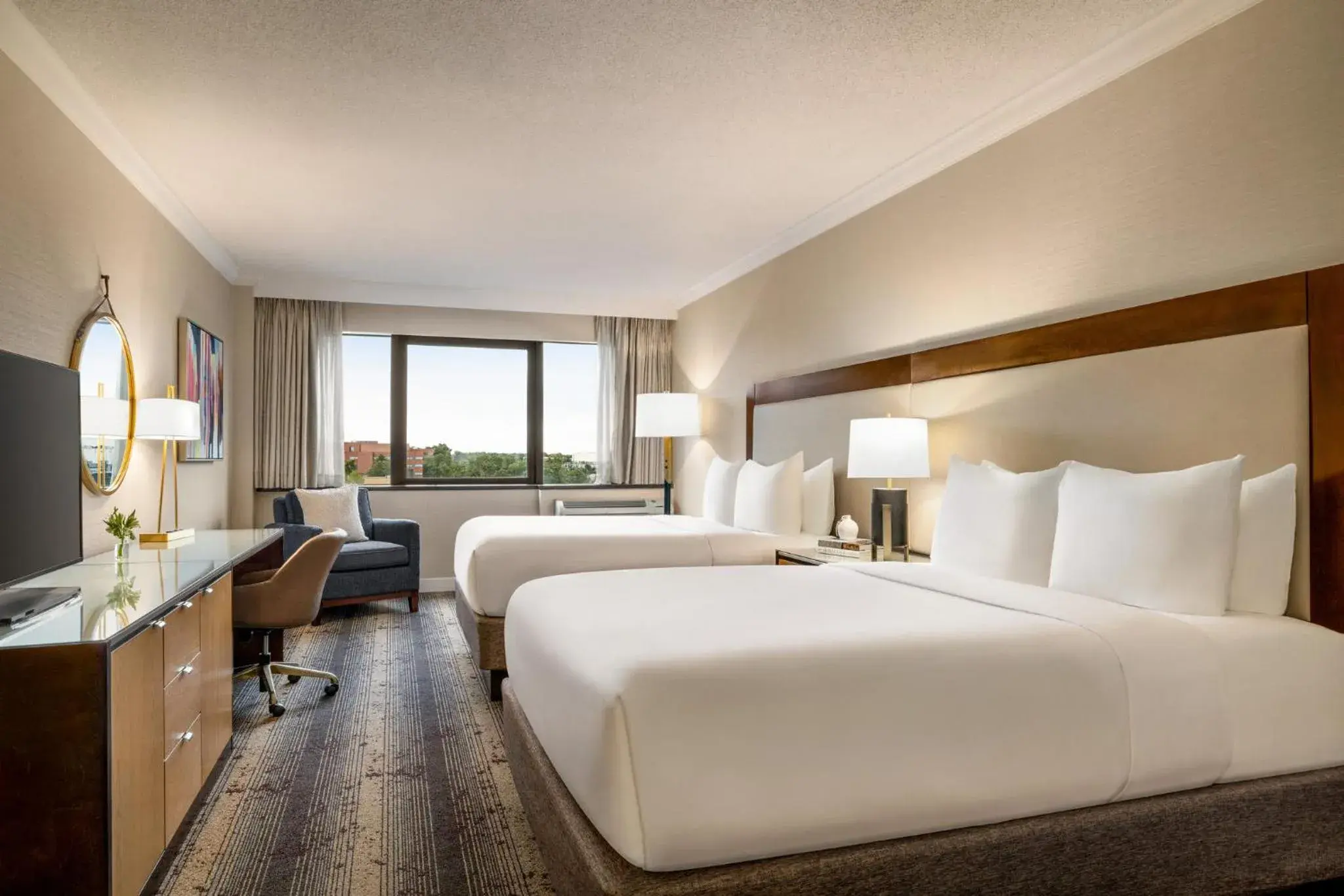 Standard Queen Room with Two Queen Beds and Mobility Accessible Tub in Crowne Plaza Edison by IHG Standard Queen Room with Two Queen Beds and Mobility Accessible Tub in Crowne Plaza Edison by IHG