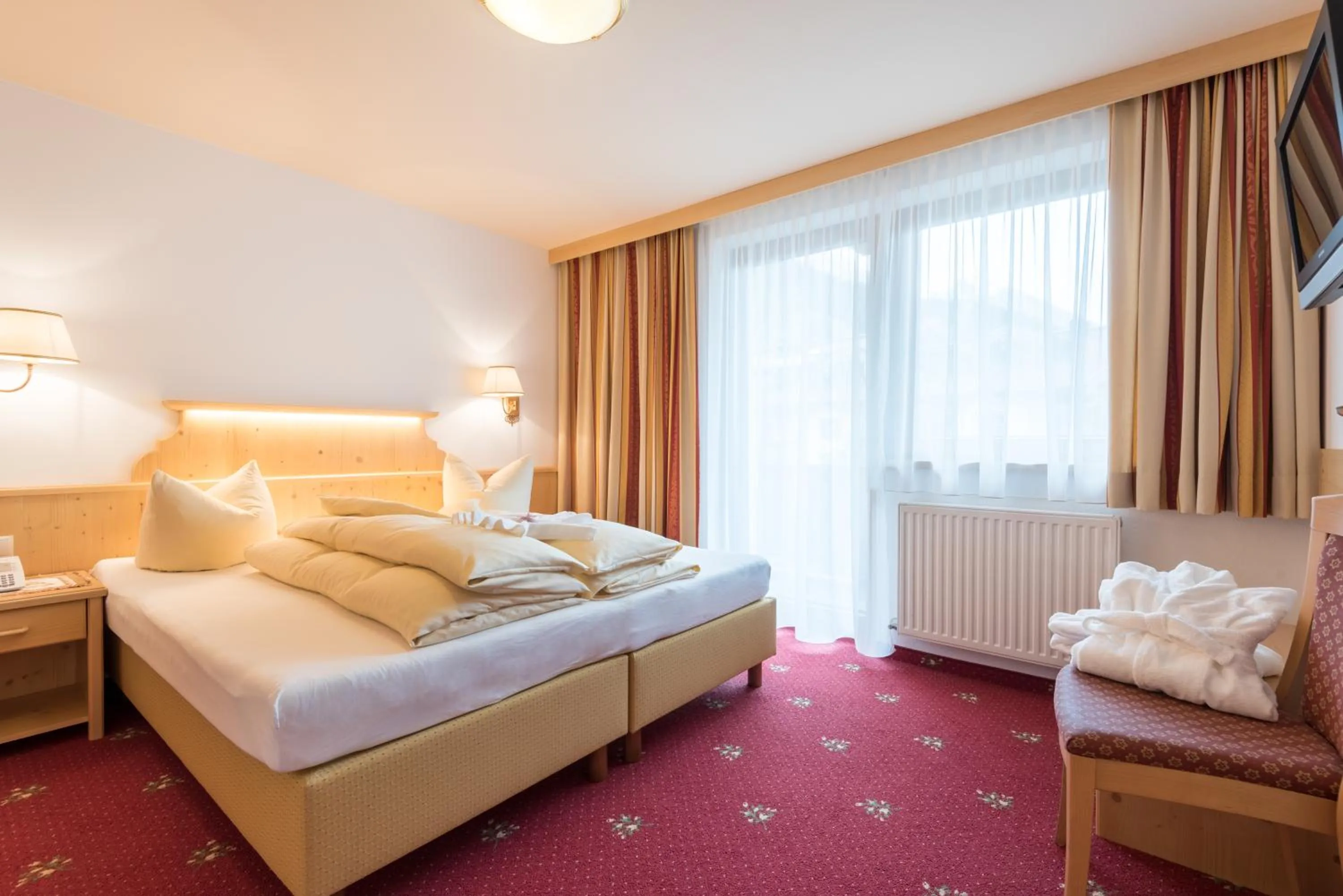 Bed in Hotel Pinzger Tux