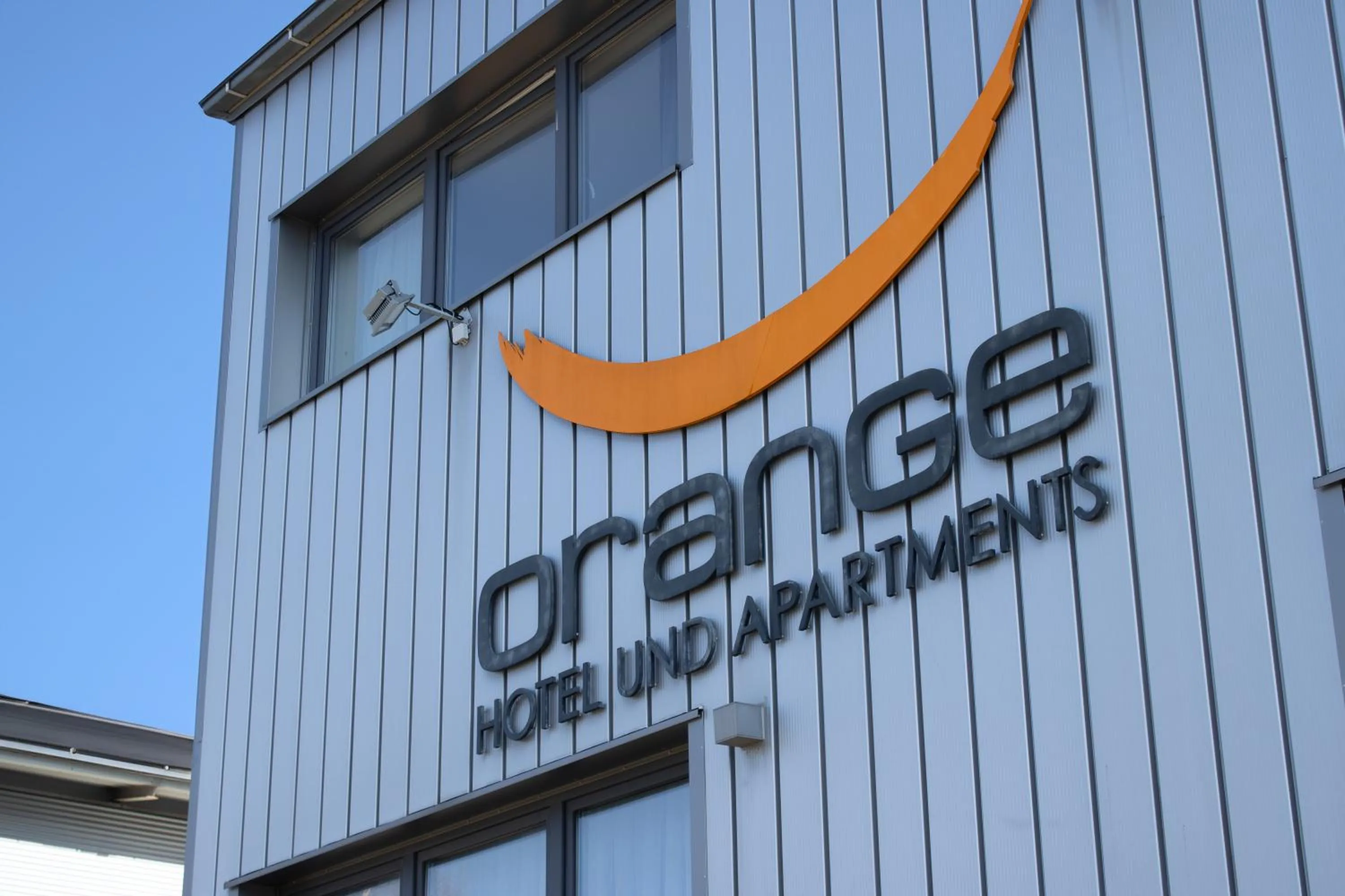 Property building in Orange Hotel und Apartments