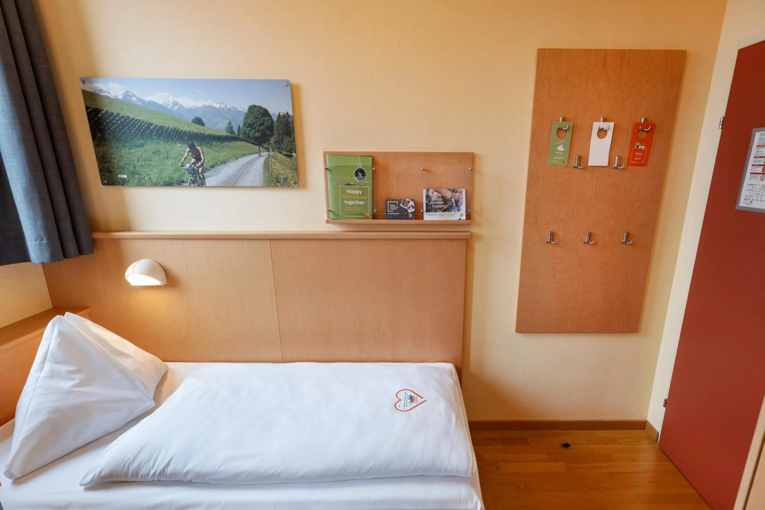 Photo of the whole room, Bed in JUFA Hotel Kaprun - Summercard included