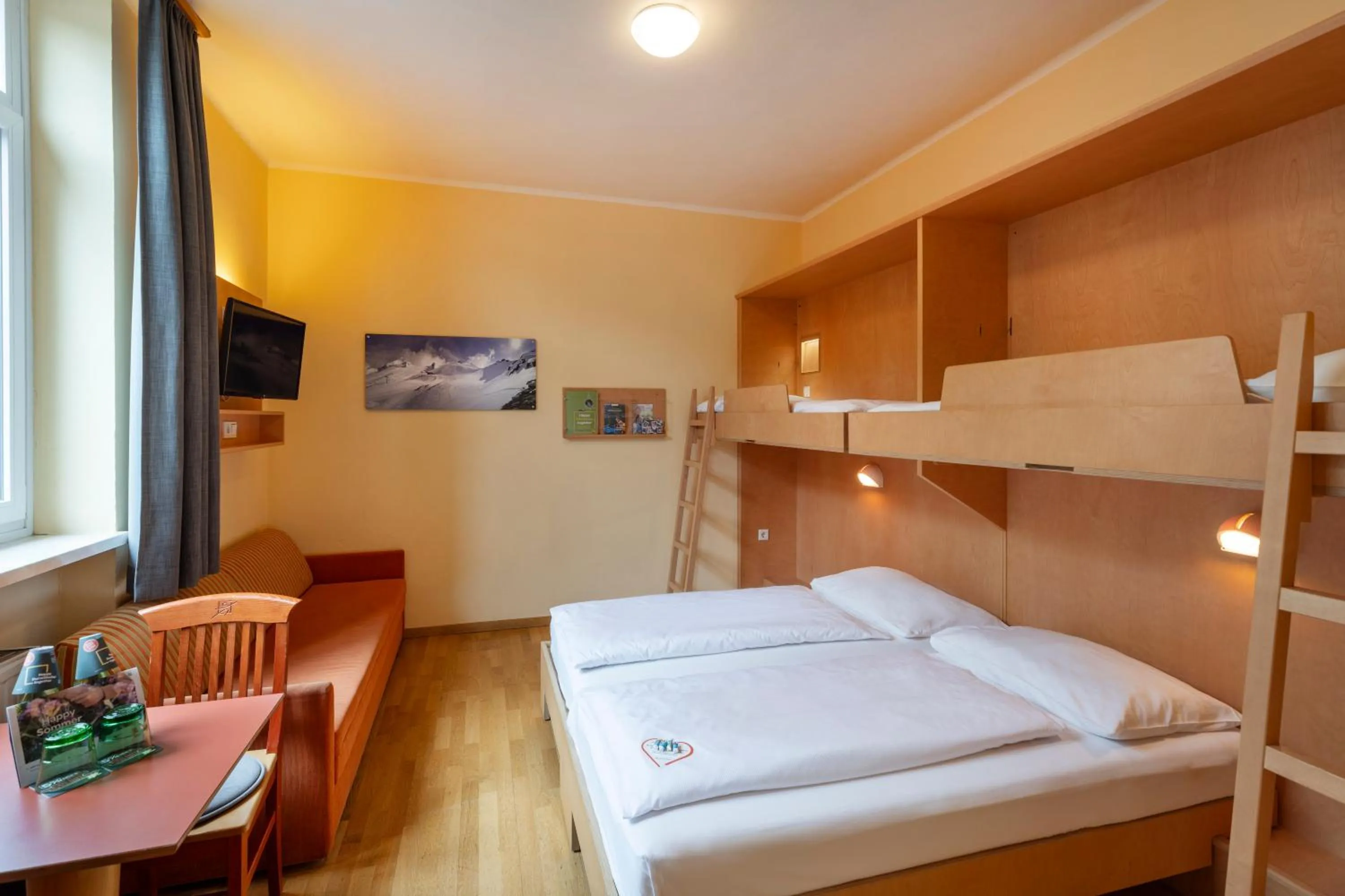 Photo of the whole room, Bed in JUFA Hotel Kaprun - Summercard included