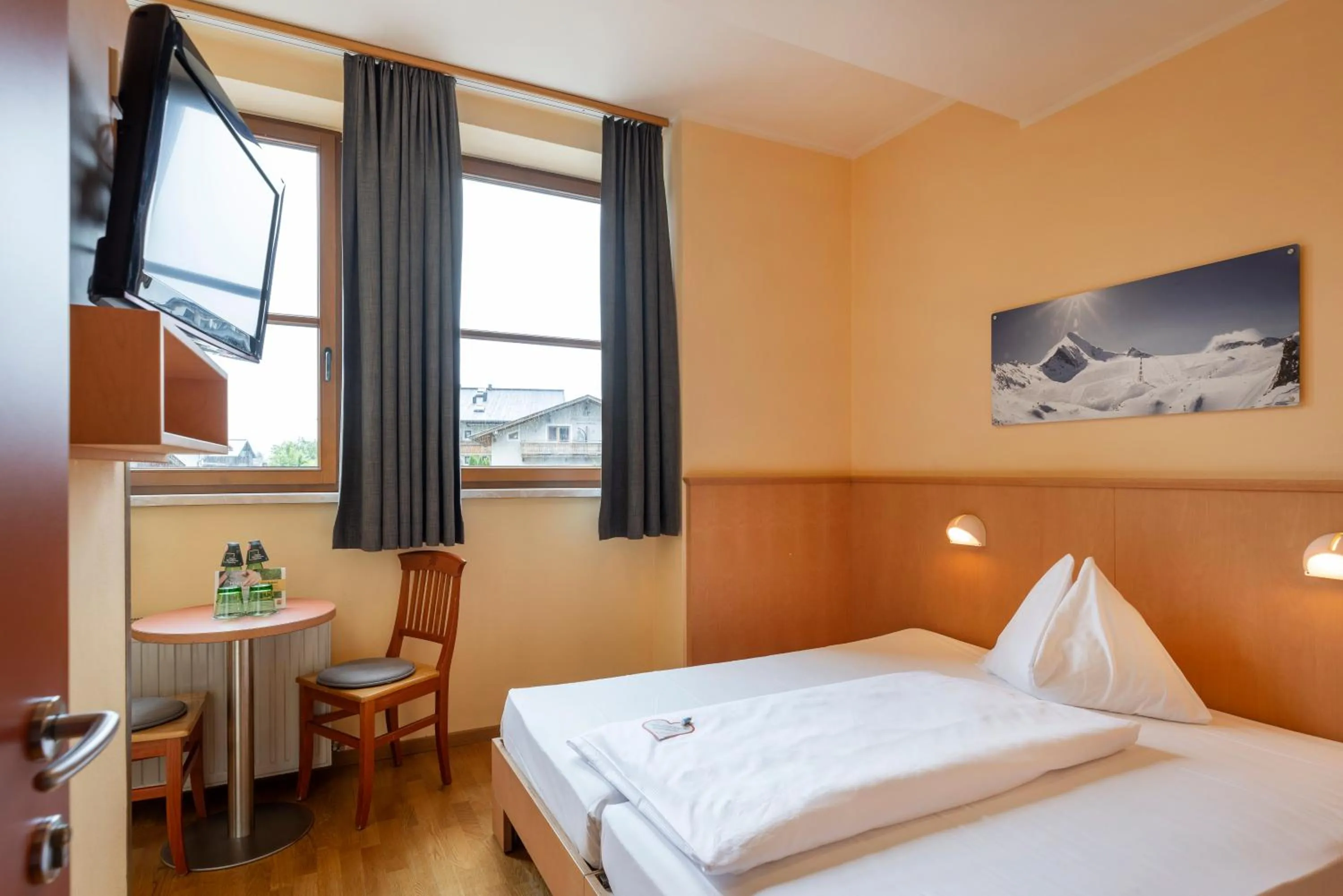 Photo of the whole room, Bed in JUFA Hotel Kaprun - Summercard included