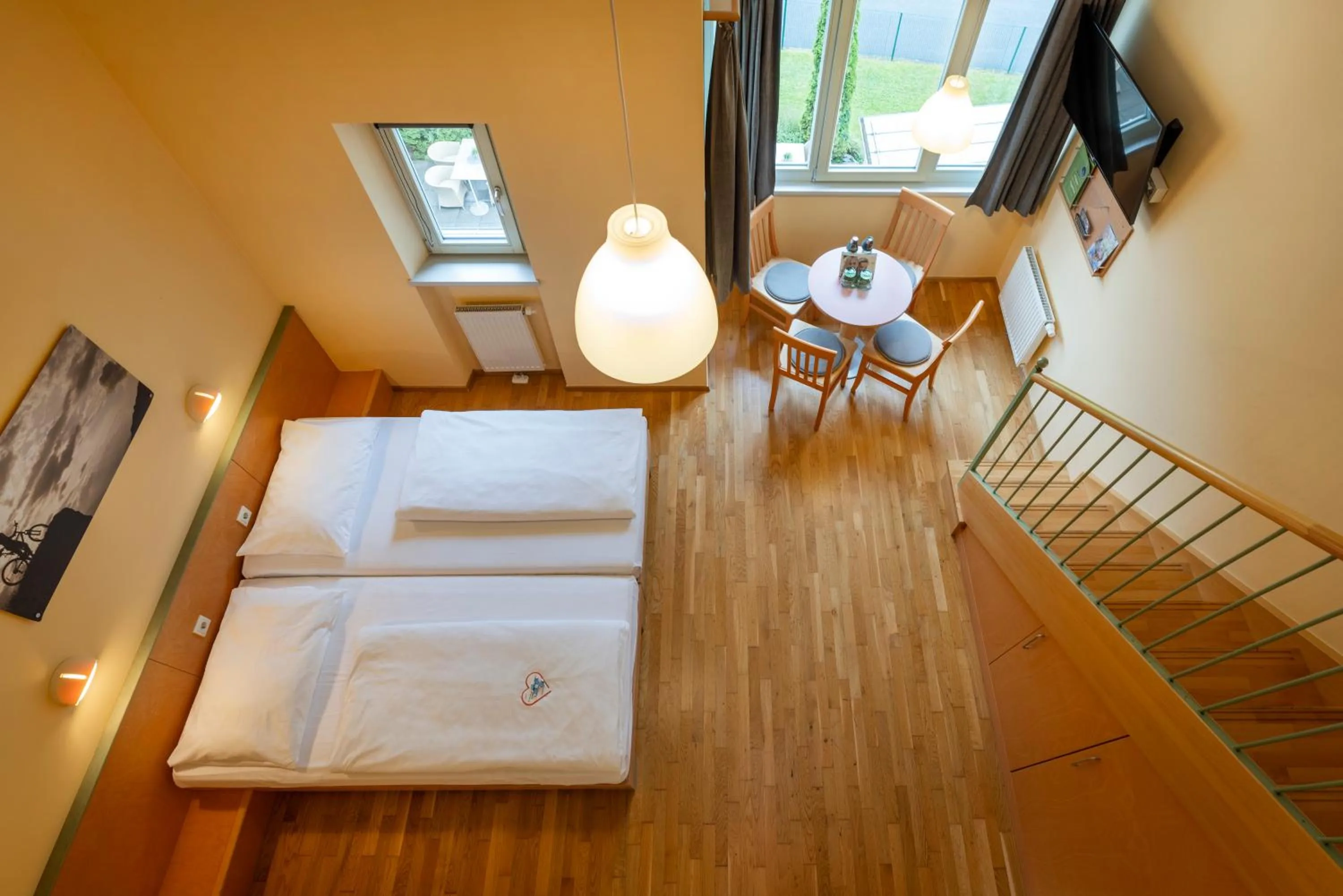 Photo of the whole room, Bed in JUFA Hotel Kaprun - Summercard included