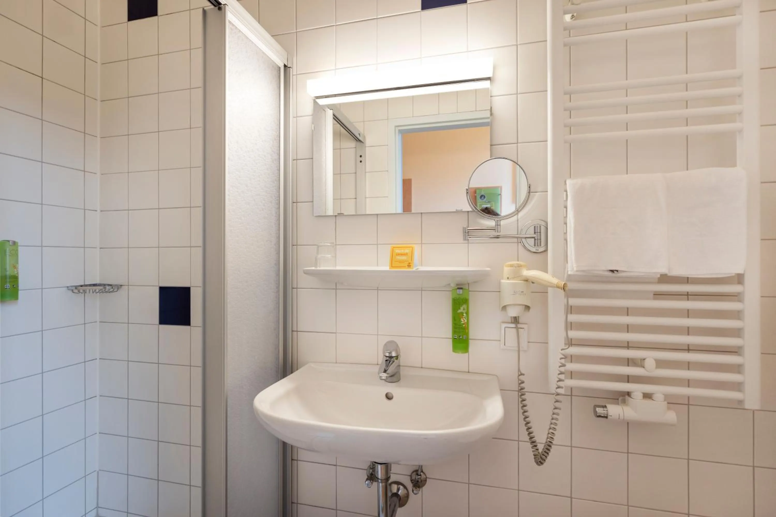 Bathroom in JUFA Hotel Kaprun - Summercard included