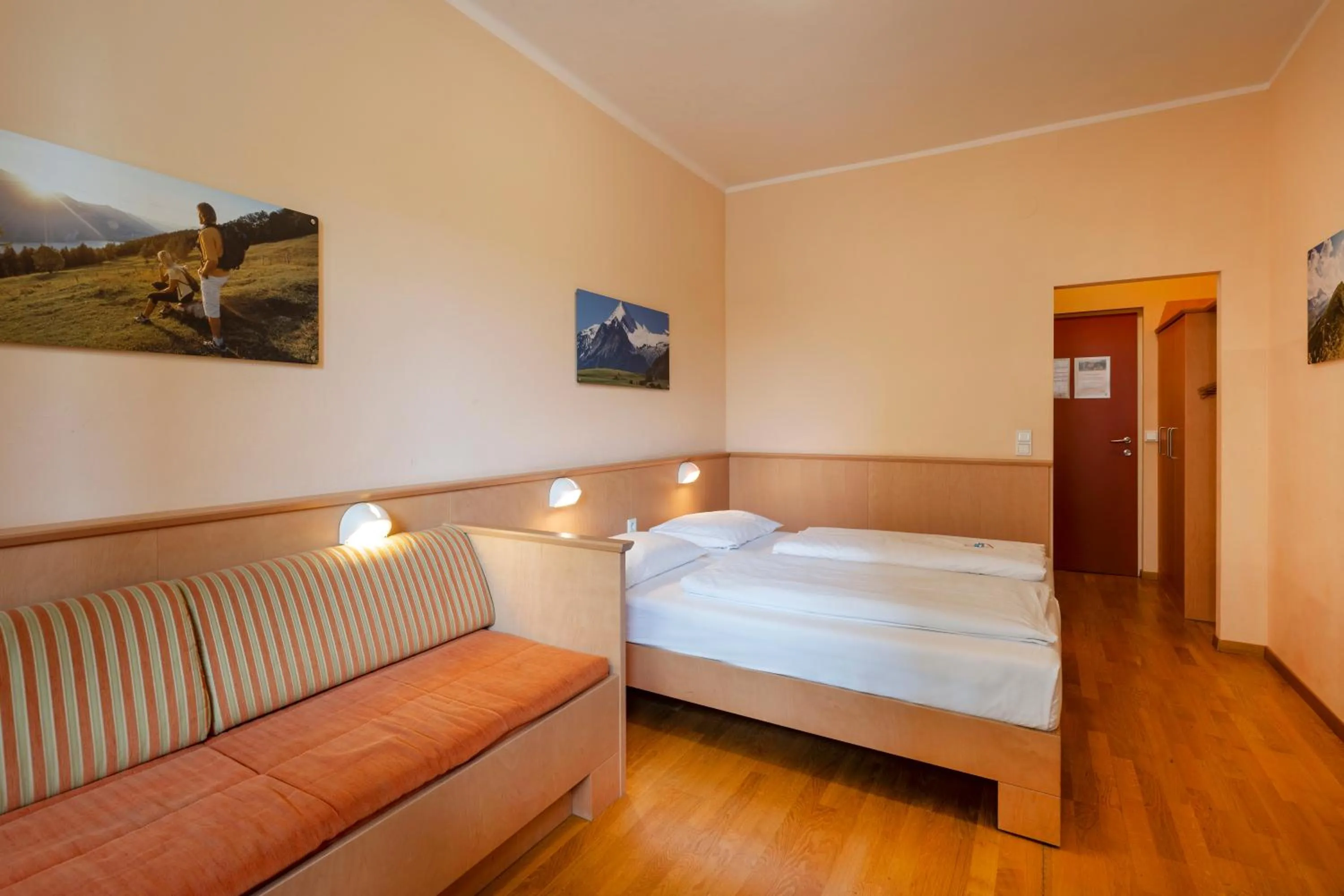 Photo of the whole room, Bed in JUFA Hotel Kaprun - Summercard included