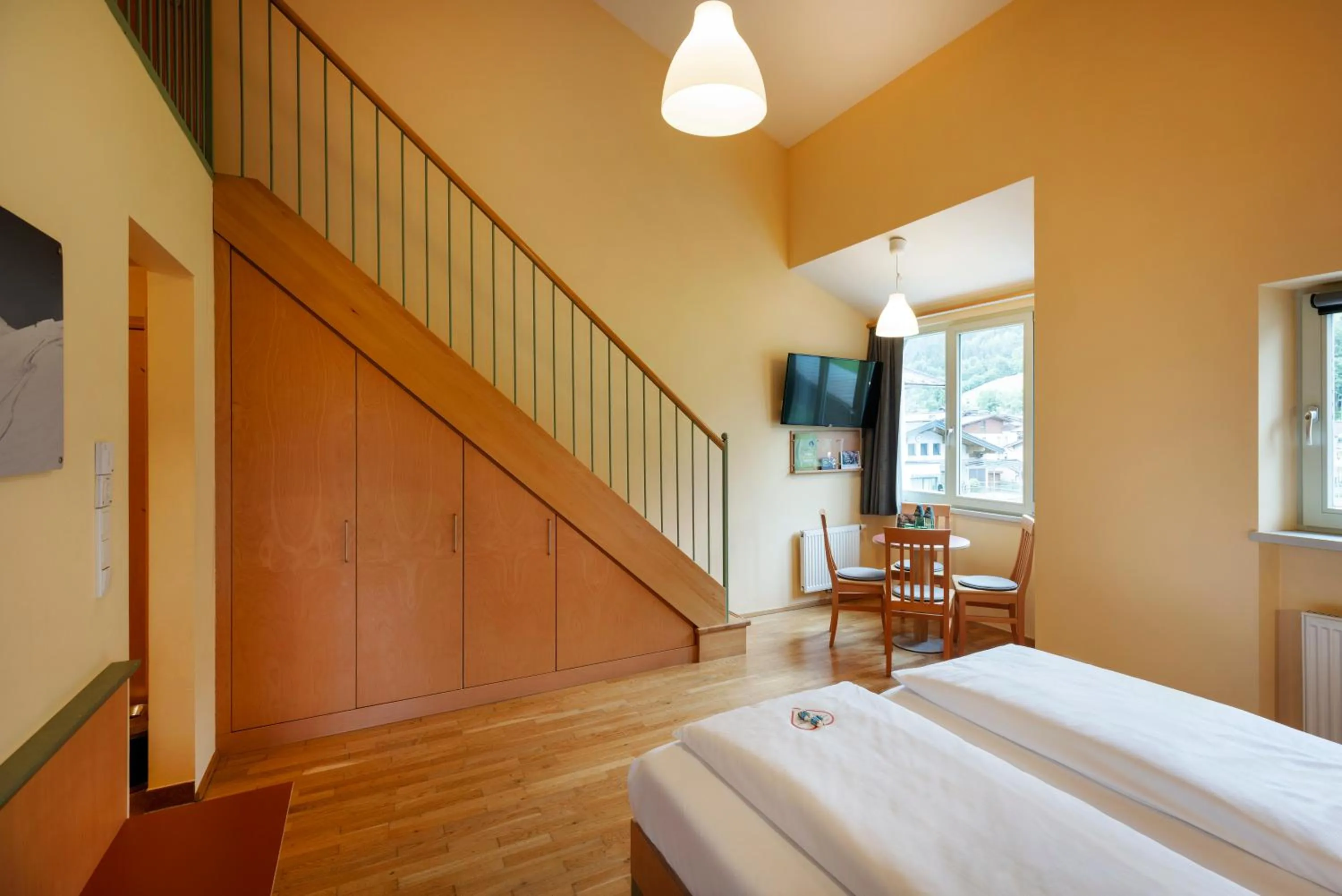 Photo of the whole room, Bed in JUFA Hotel Kaprun - Summercard included