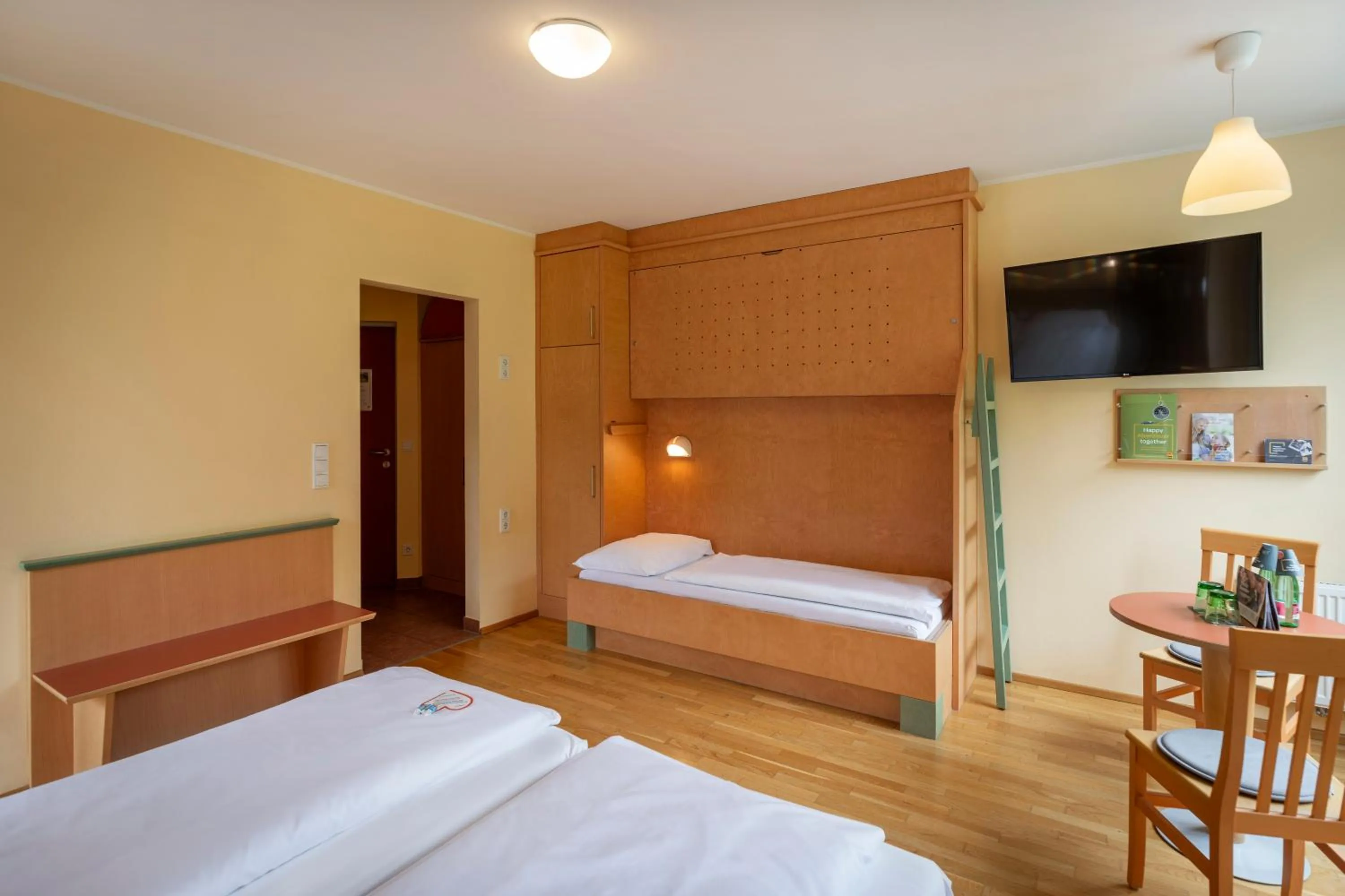 Photo of the whole room, Bed in JUFA Hotel Kaprun - Summercard included