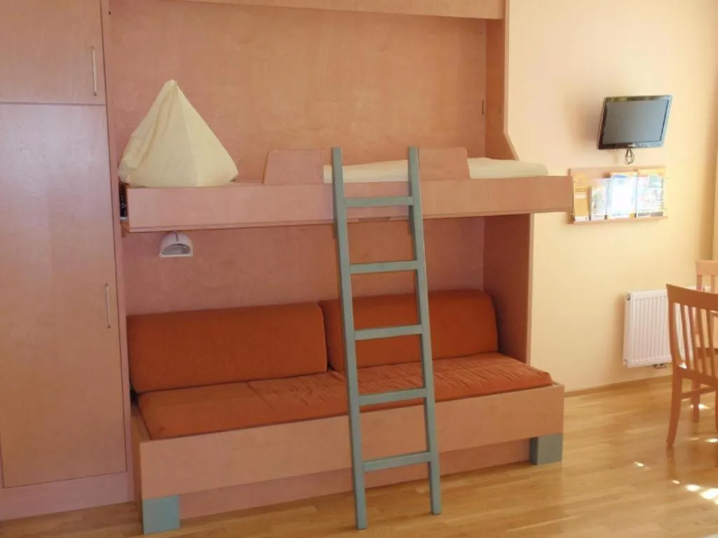 Photo of the whole room, Bed in JUFA Hotel Kaprun - Summercard included