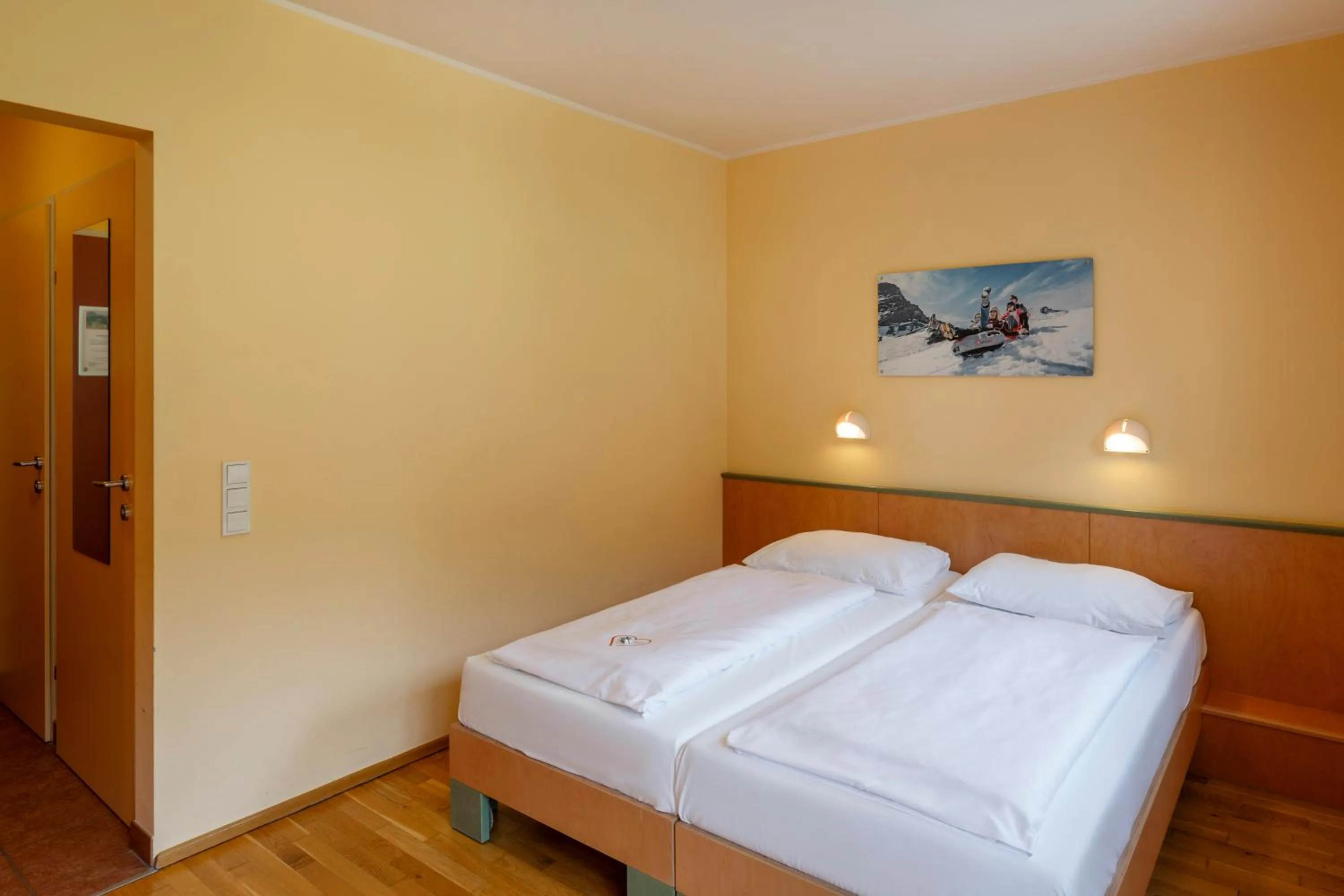 Photo of the whole room, Bed in JUFA Hotel Kaprun - Summercard included