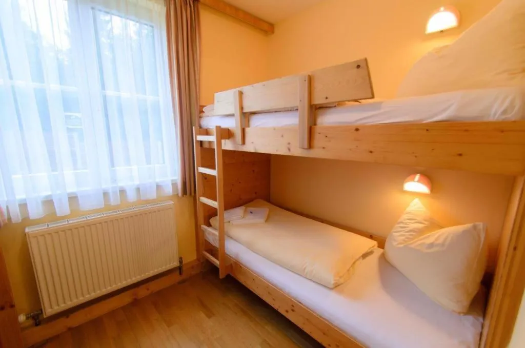 Photo of the whole room, Bed in JUFA Hotel Kaprun - Summercard included