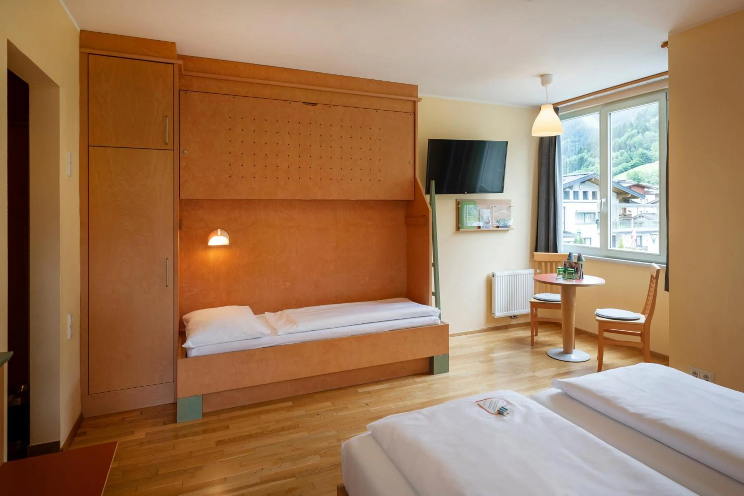 Photo of the whole room, Bed in JUFA Hotel Kaprun - Summercard included