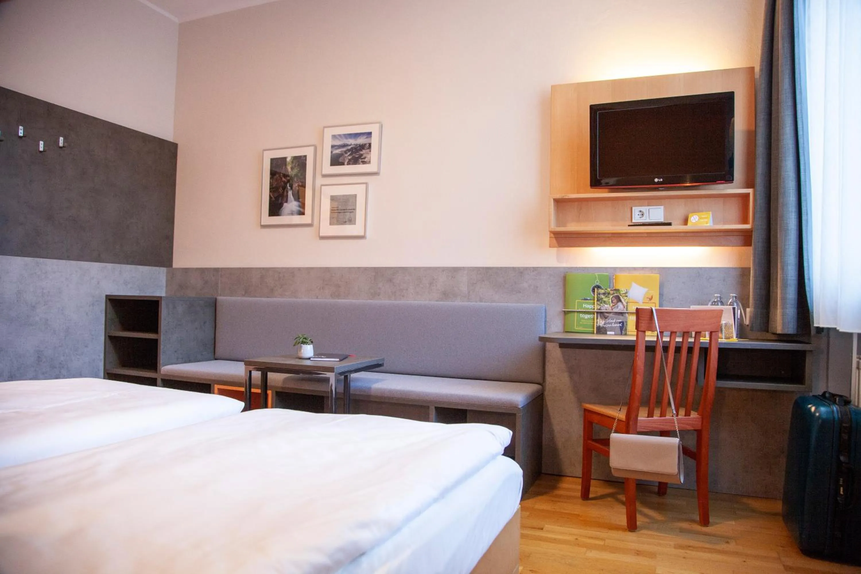 Photo of the whole room, Bed in JUFA Hotel Kaprun - Summercard included